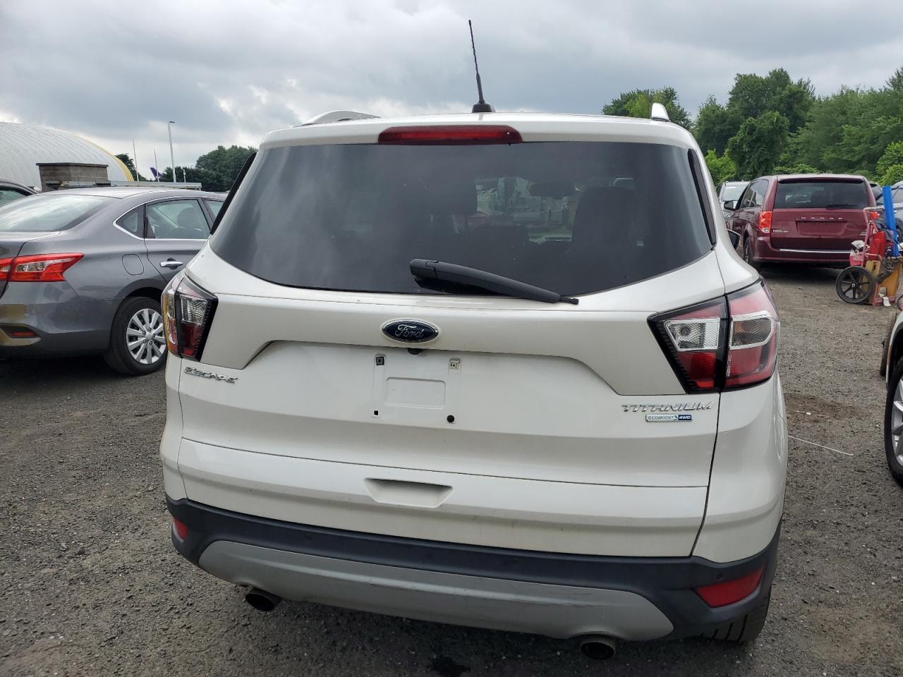 2017 Ford Escape Titanium VIN: 1FMCU9J97HUC06001 Lot: 64237615