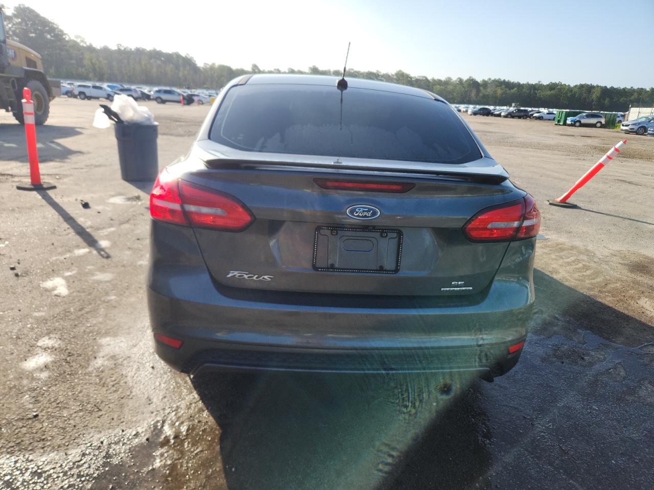 2016 Ford Focus Se VIN: 1FADP3F20GL304743 Lot: 64641365