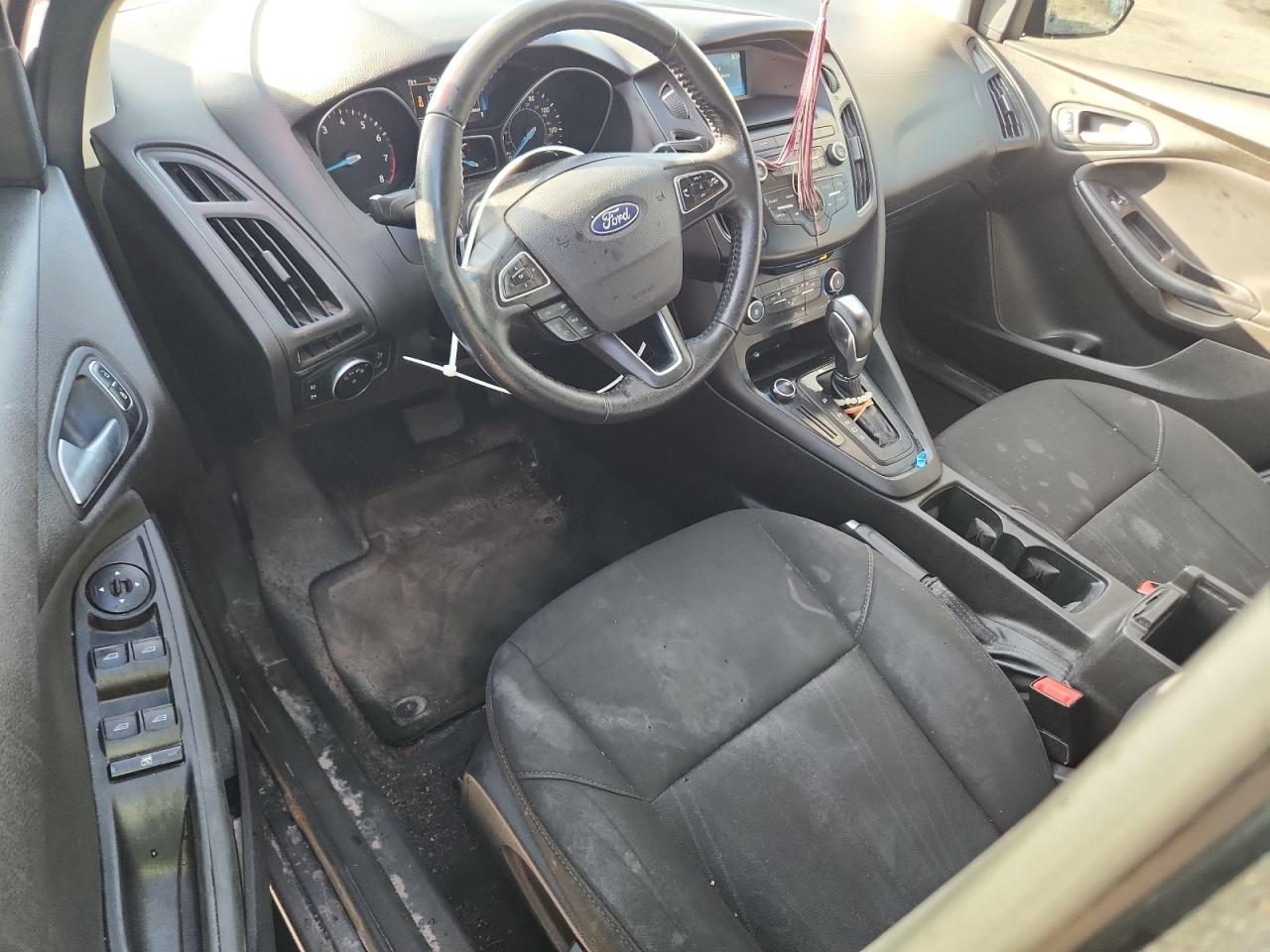 2016 Ford Focus Se VIN: 1FADP3F20GL304743 Lot: 64641365