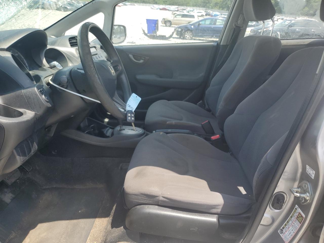 2009 Honda Fit VIN: JHMGE88209S052944 Lot: 65504835