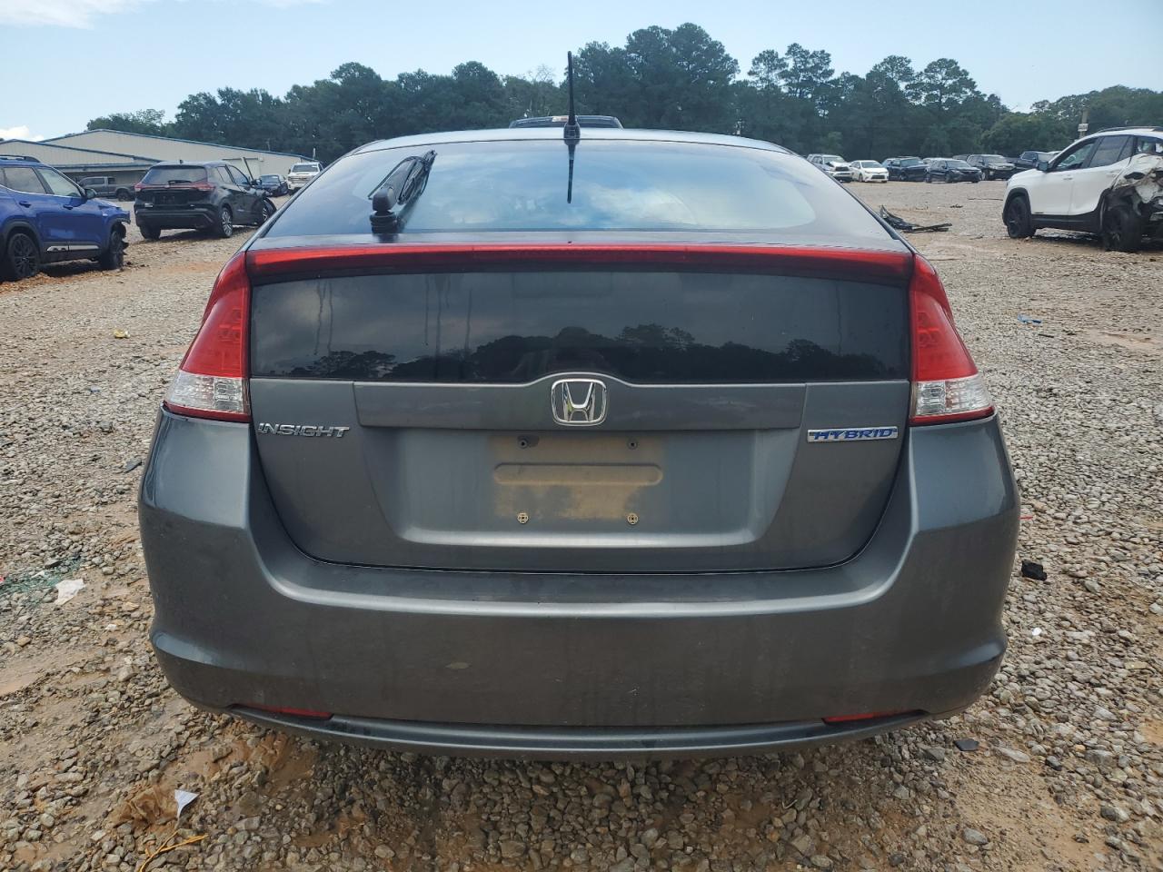 2011 Honda Insight VIN: JHMZE2H38BS003088 Lot: 63558885
