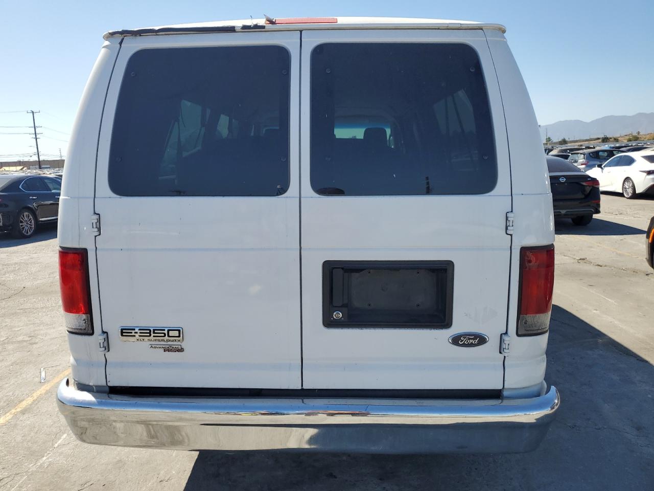 2014 Ford Econoline E350 Super Duty Wagon VIN: 1FBSS3BL4EDA85358 Lot: 62875725