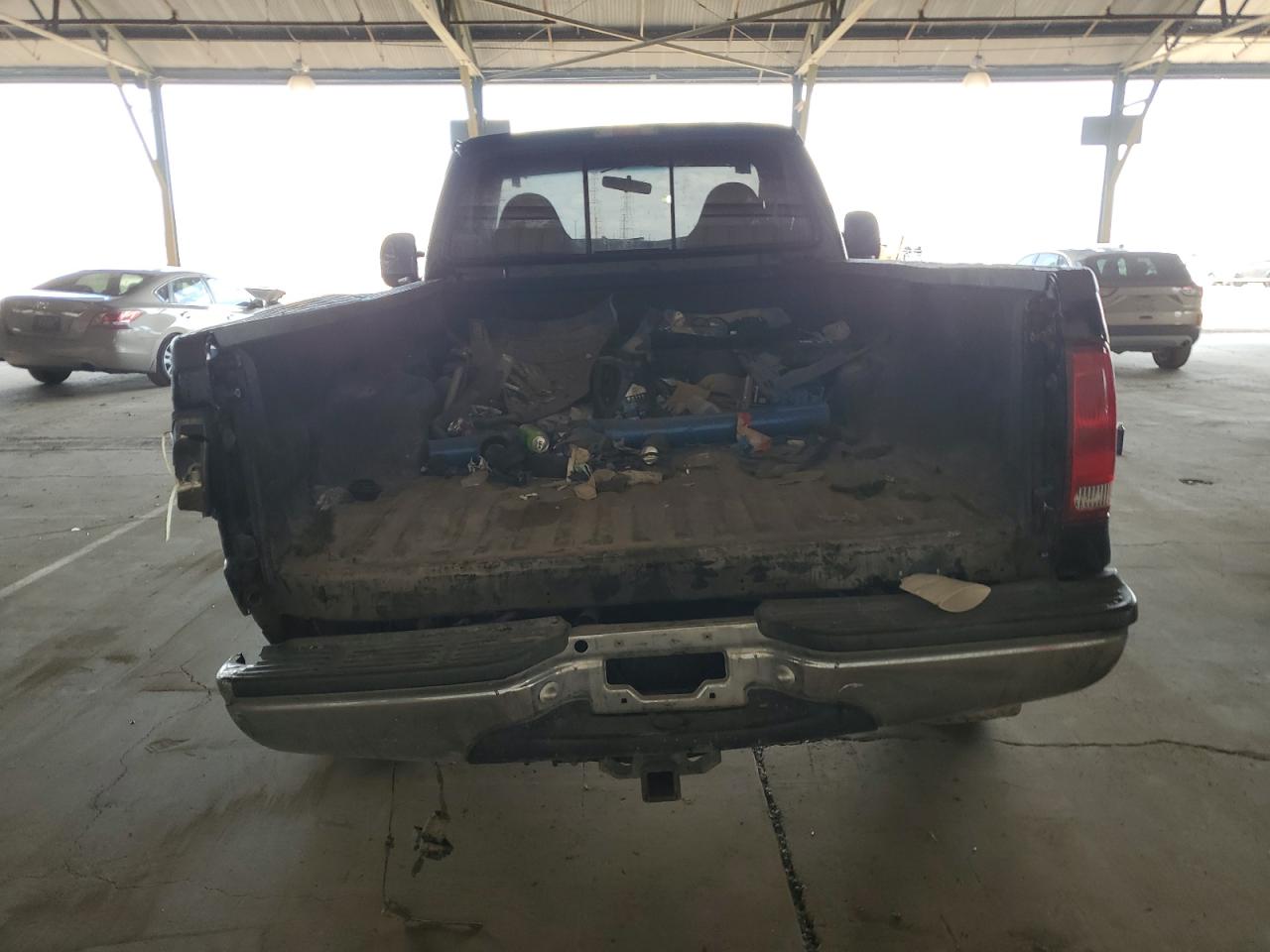 1999 Ford F250 Super Duty VIN: 1FTNF21F0XEA06235 Lot: 65437075