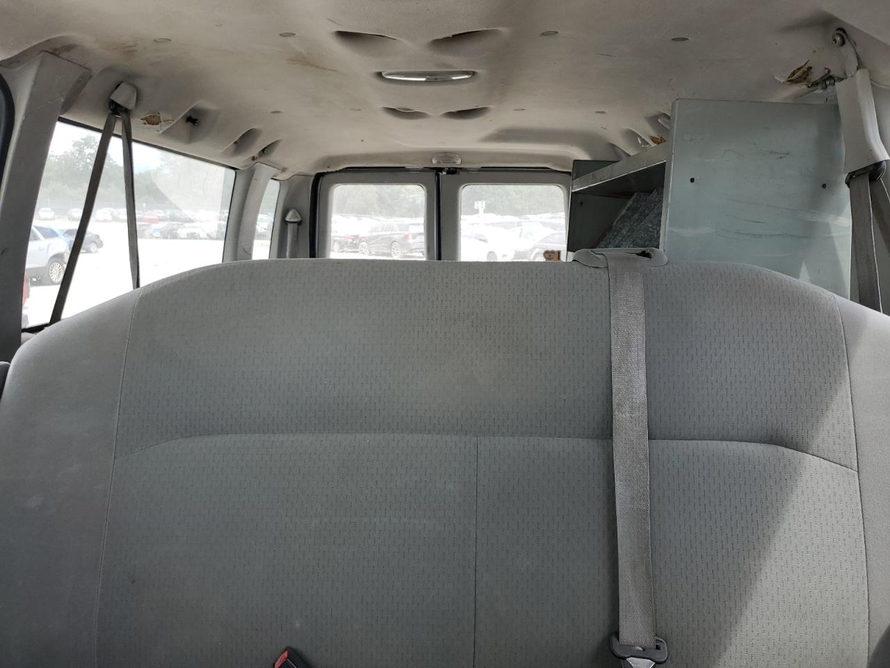 2009 Ford Econoline E350 Super Duty Wagon VIN: 1FBSS31LX9DA71035 Lot: 65399725