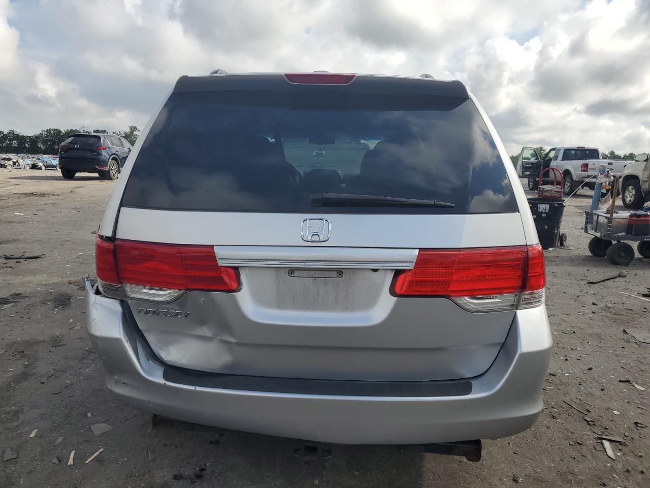 2010 Honda Odyssey Exl VIN: 5FNRL3H73AB101022 Lot: 64494385