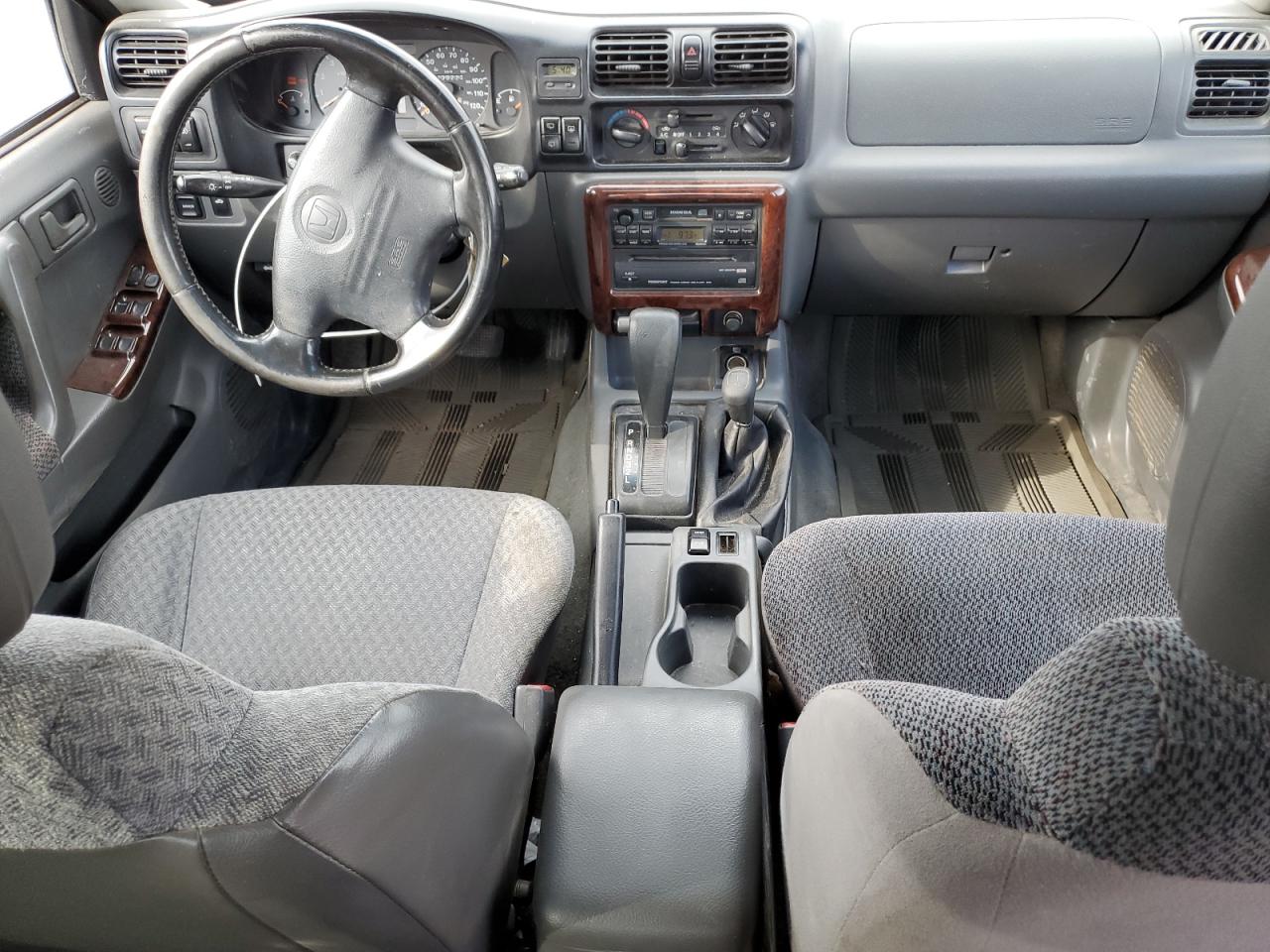 1999 Honda Passport Ex VIN: 4S6CM58W2X4421408 Lot: 63278385