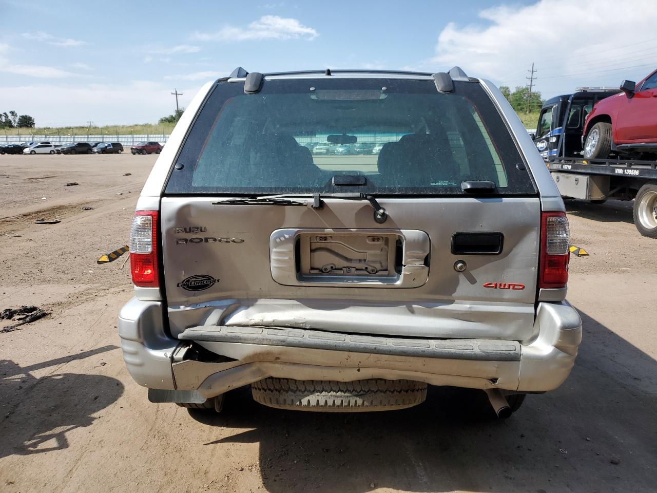 2001 Isuzu Rodeo S VIN: 4S2DM58W914314305 Lot: 62996225