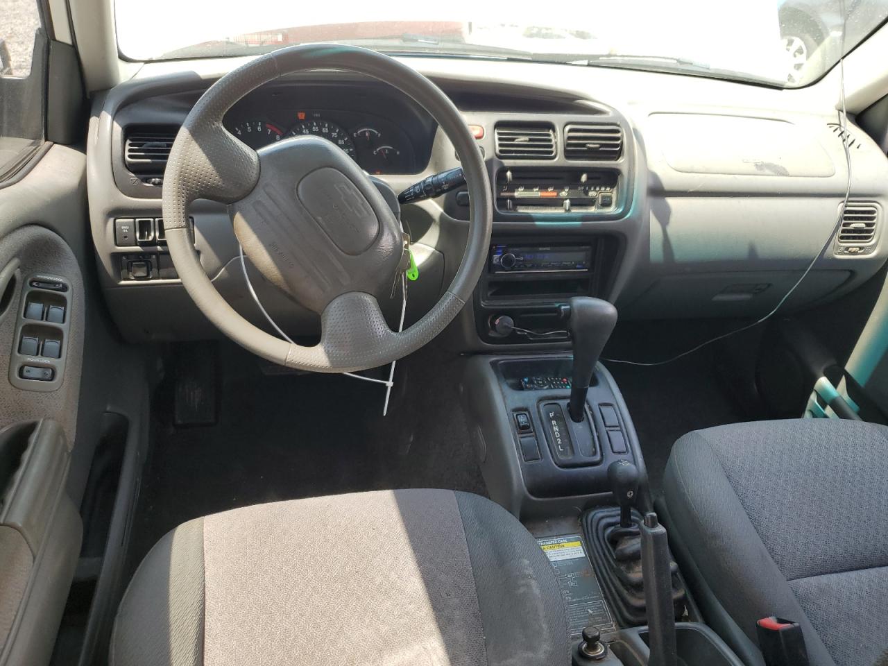 1999 Chevrolet Tracker VIN: 2CNBJ13CXX6914447 Lot: 64100275