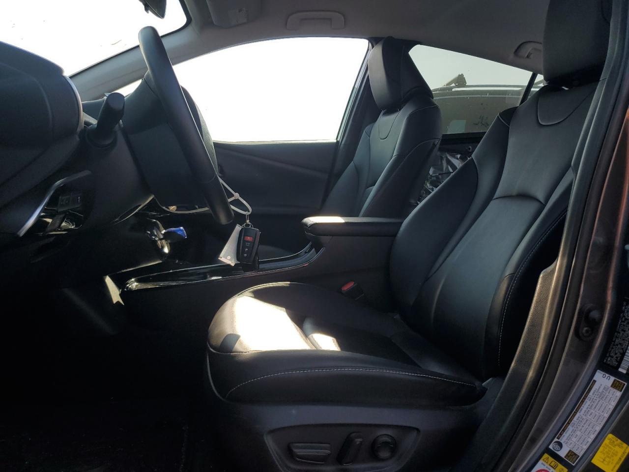 2021 Toyota Prius Prime Le VIN: JTDKAMFP7M3165758 Lot: 65004465