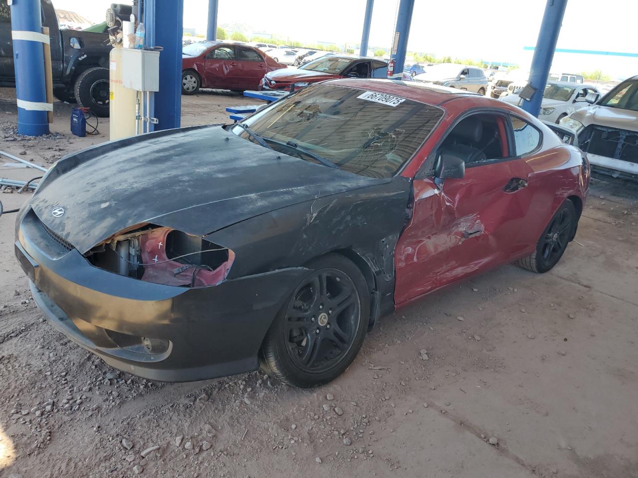 2005 Hyundai Tiburon Gt VIN: KMHHN65F05U174909 Lot: 66709075