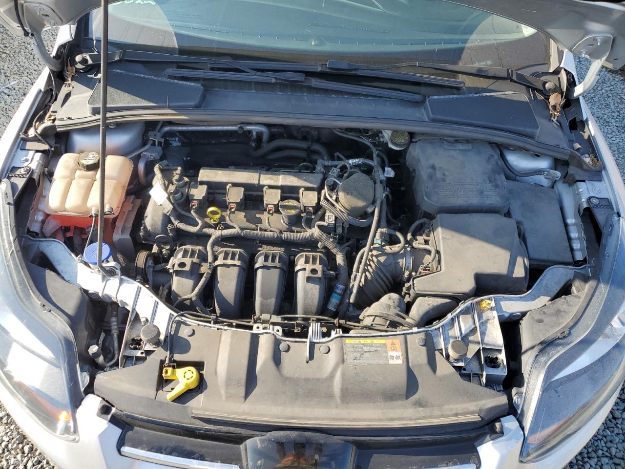 2013 Ford Focus Titanium VIN: 1FADP3J24DL116892 Lot: 65040065