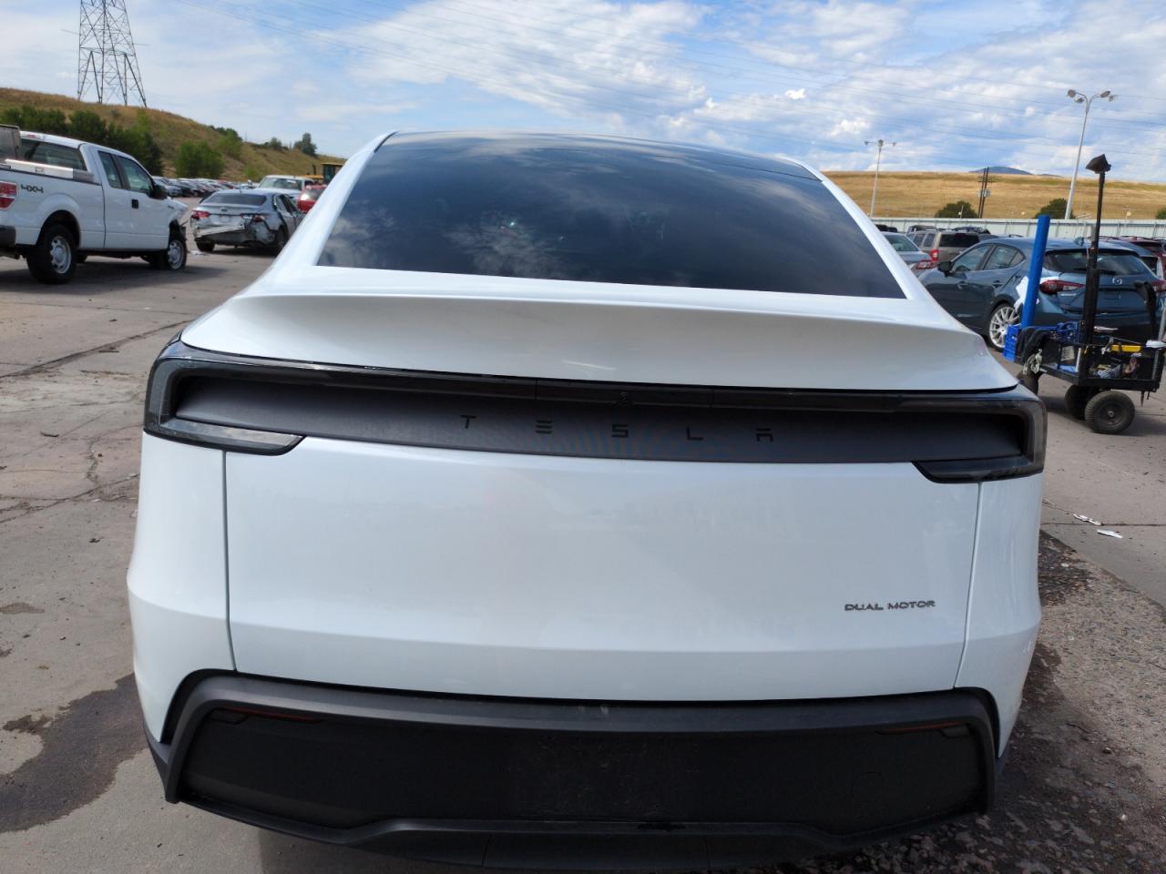 2026 Tesla Model Y VIN: 7SAYGDEE0TA438498 Lot: 65991225