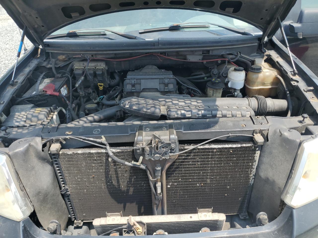 2005 Ford F150 VIN: 1FTPX12565FA38328 Lot: 63853605