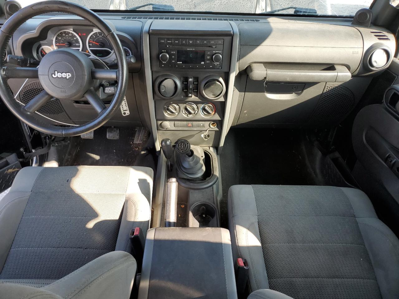 2007 Jeep Wrangler Sahara VIN: 1J4GA591X7L202948 Lot: 64268695