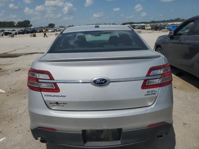 Седани FORD TAURUS 2014 Сріблястий