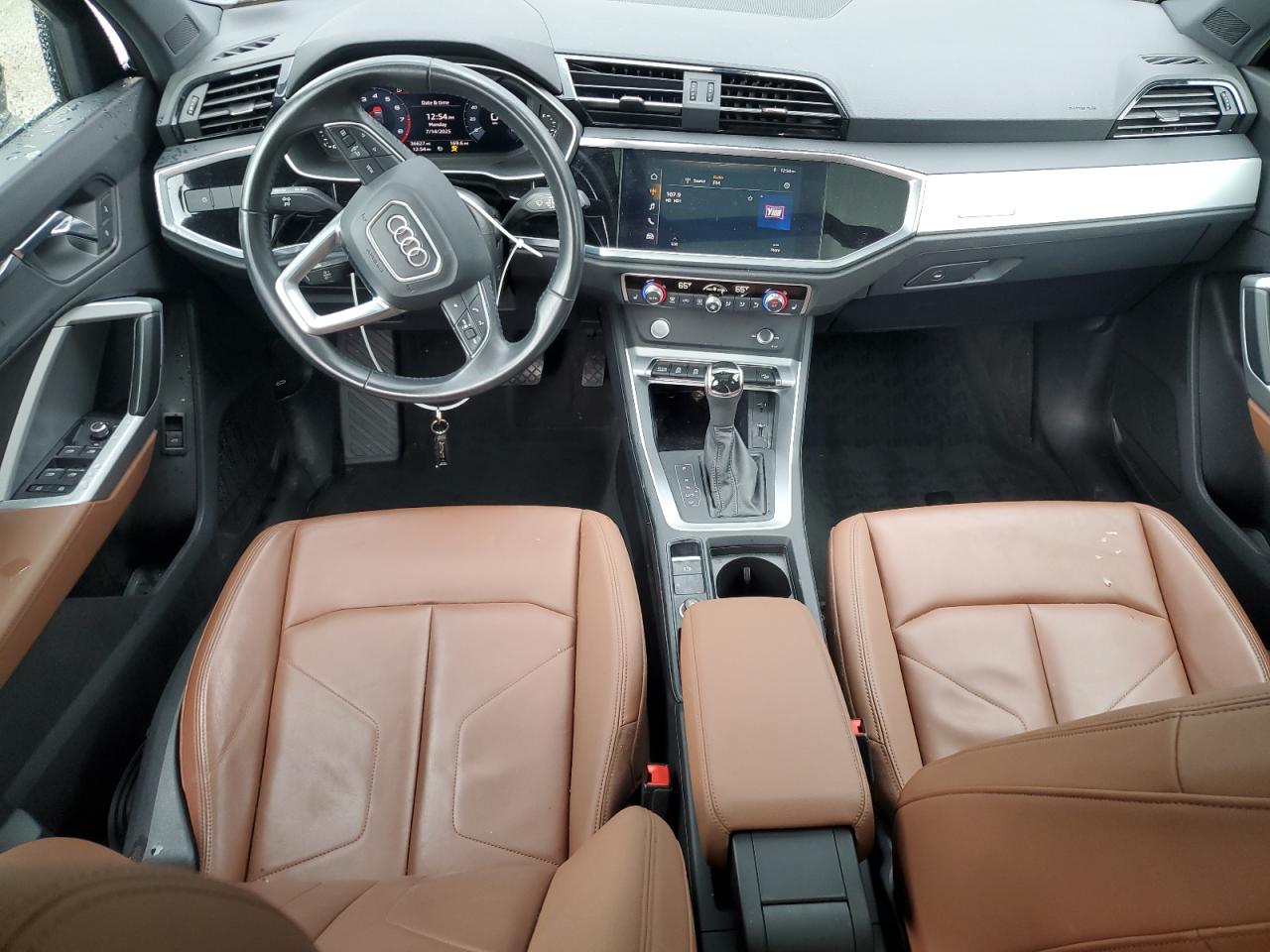 2020 Audi Q3 Premium VIN: WA1AECF37L1068023 Lot: 64477205