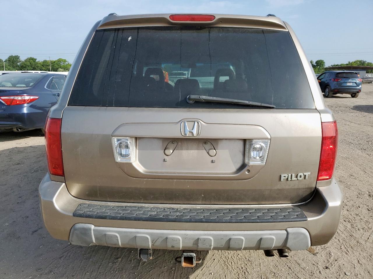 2004 Honda Pilot Exl VIN: 2HKYF18704H562661 Lot: 62838525
