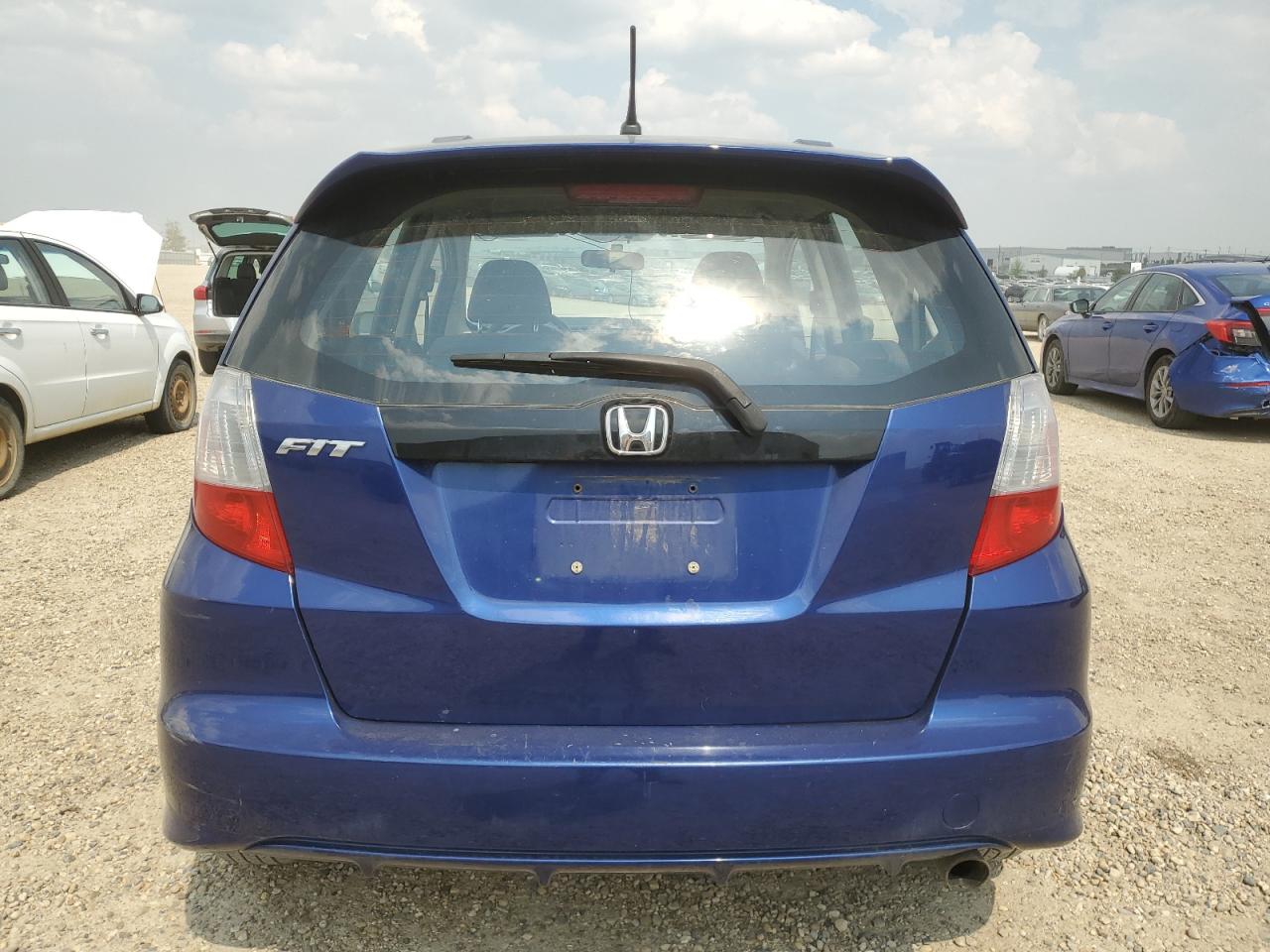 2013 Honda Fit Sport VIN: LUCGE8H71D3007426 Lot: 64850125
