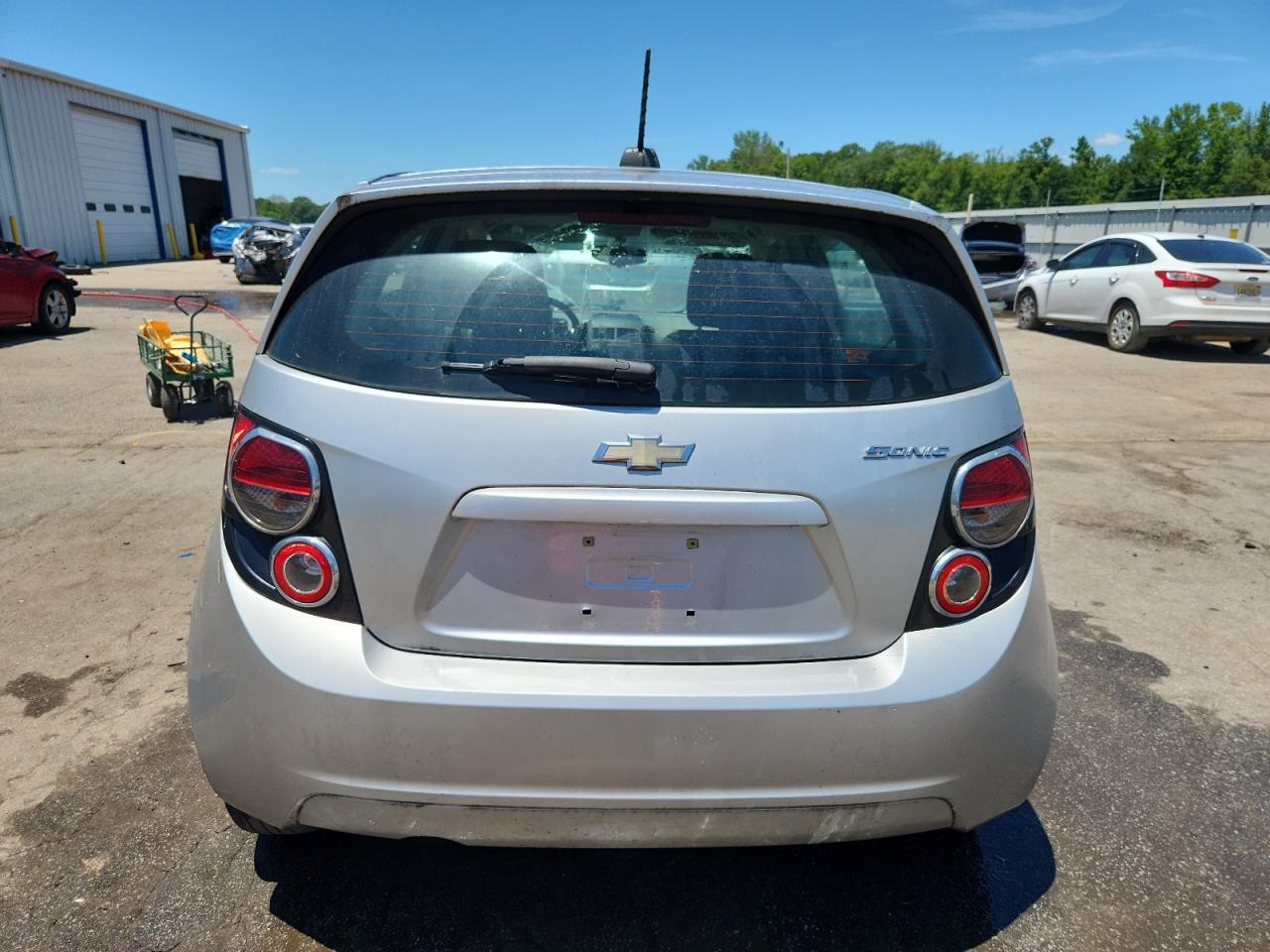 2015 Chevrolet Sonic Ls VIN: 1G1JB6SG3F4113902 Lot: 64448205