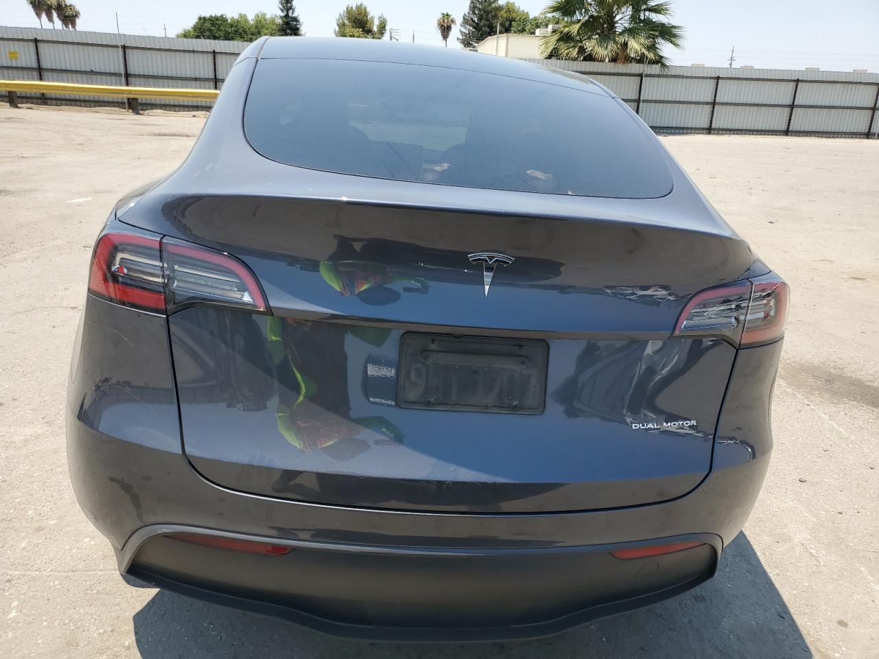 2023 Tesla Model Y VIN: 7SAYGDEE4PF852974 Lot: 64977385