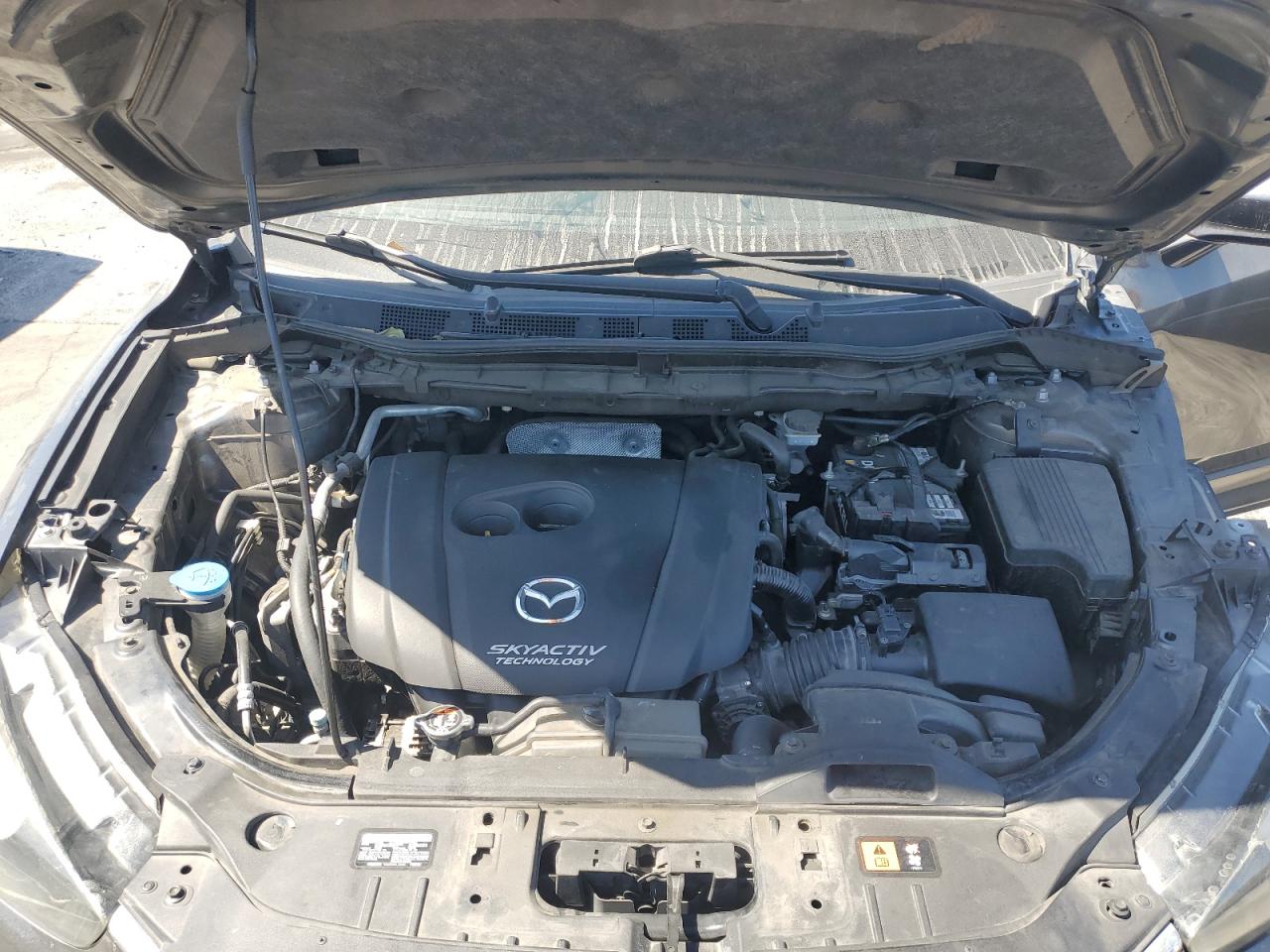 2014 Mazda Cx-5 Touring VIN: JM3KE2CY5E0330075 Lot: 63773885