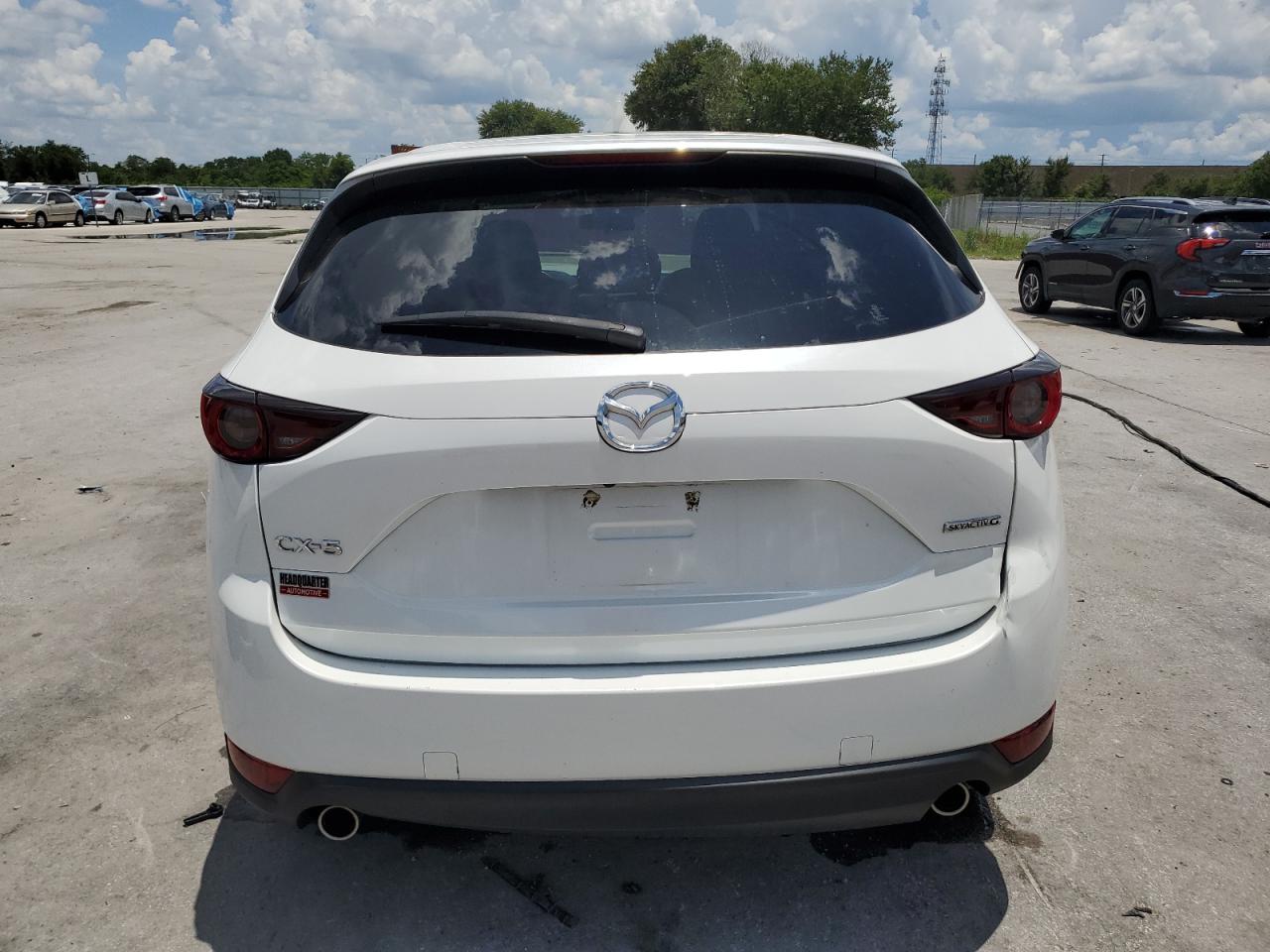 2021 Mazda Cx-5 Touring VIN: JM3KFACM3M0393677 Lot: 64406325