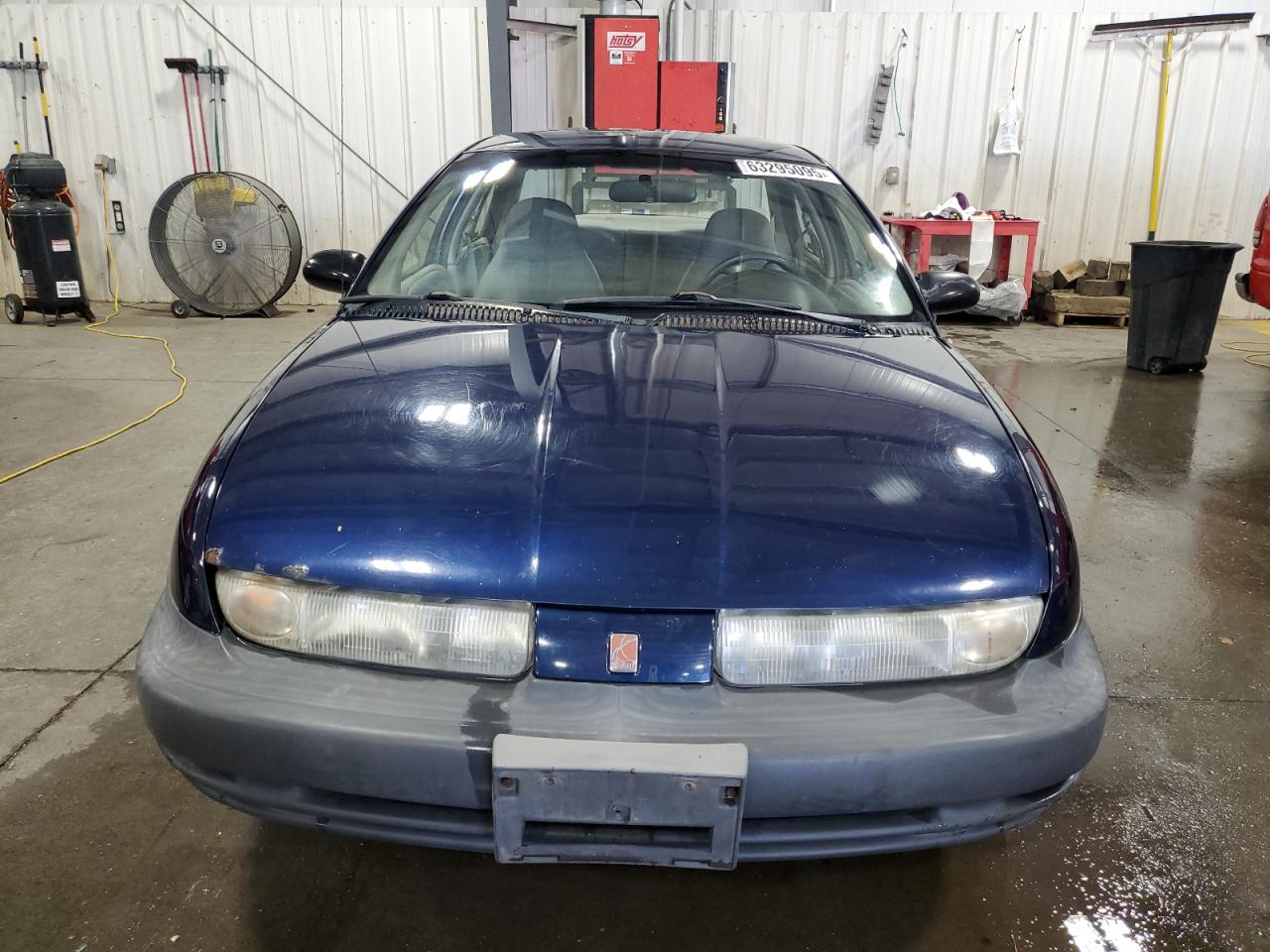 1999 Saturn Sl1 VIN: 1G8ZG5281XZ329776 Lot: 63295095