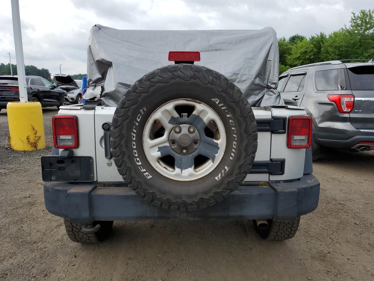 2012 Jeep Wrangler Sport VIN: 1C4AJWAG9CL157805 Lot: 65205905