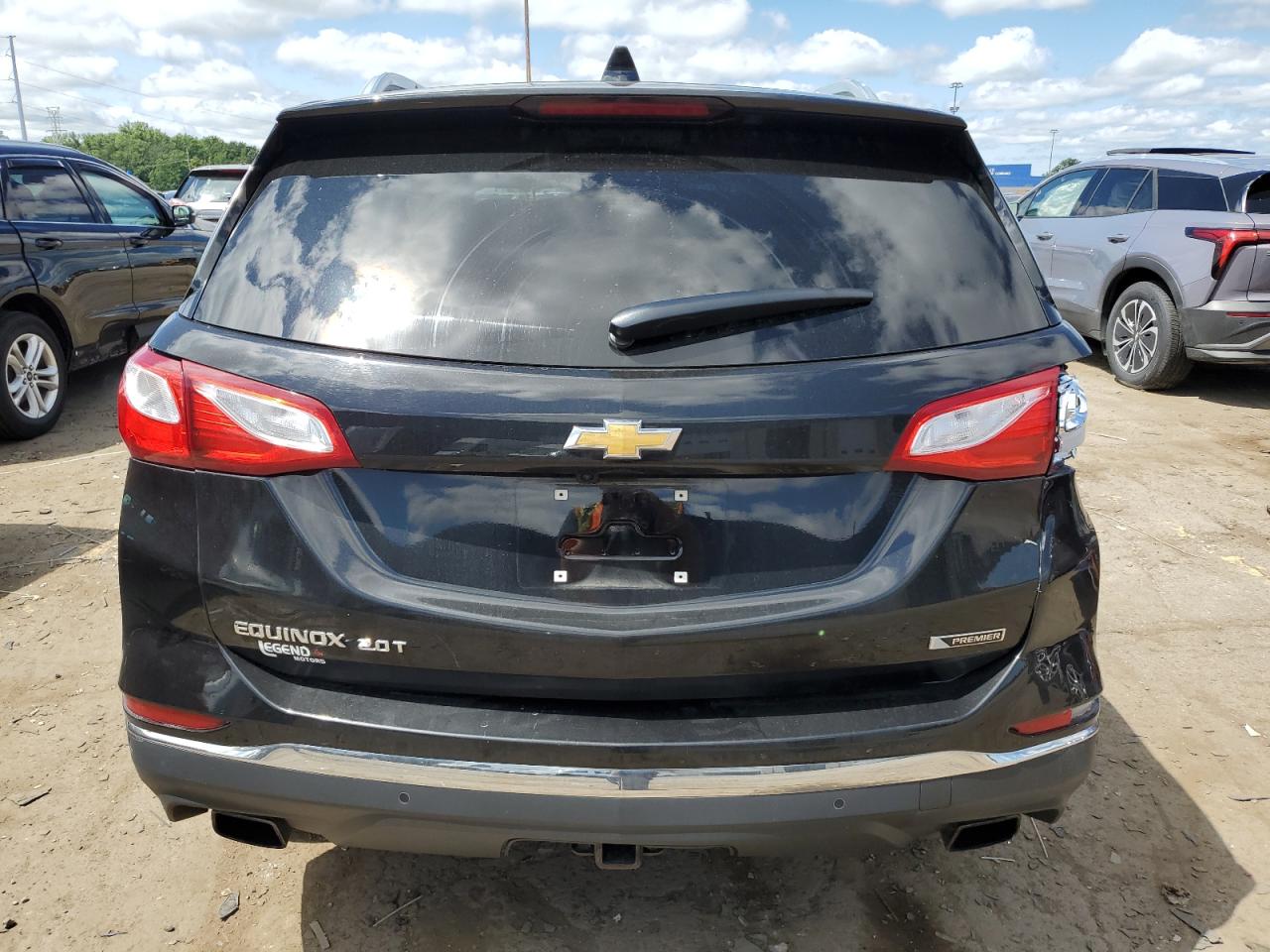 2018 Chevrolet Equinox Premier VIN: 2GNAXNEX1J6296455 Lot: 65510325