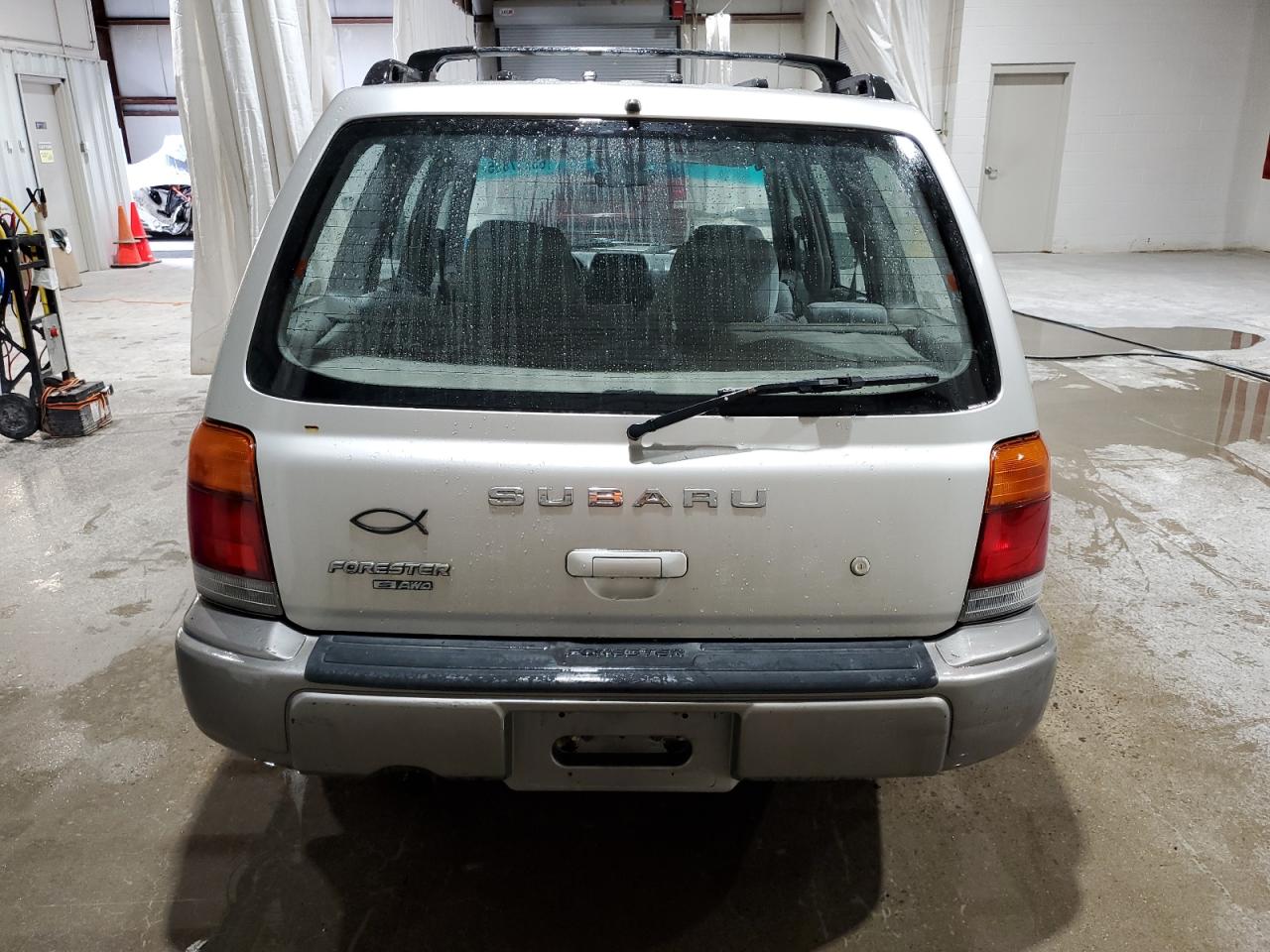 1999 Subaru Forester S VIN: JF1SF6559XH744986 Lot: 63837855