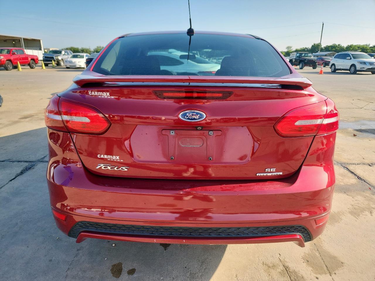 2016 Ford Focus Se VIN: 1FADP3F27GL369010 Lot: 65372035