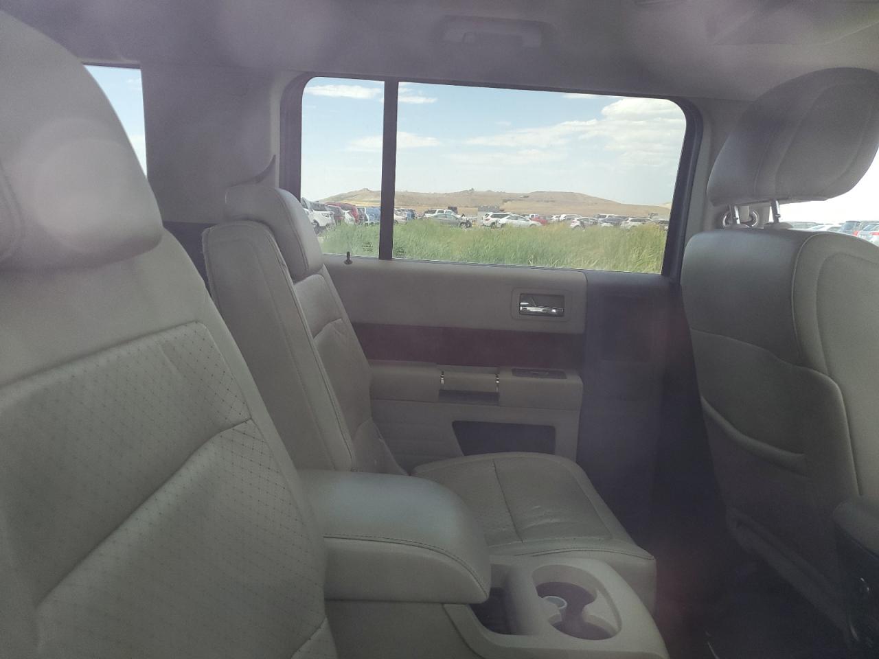 2009 Ford Flex Limited VIN: 2FMEK63C89BA18357 Lot: 63522445