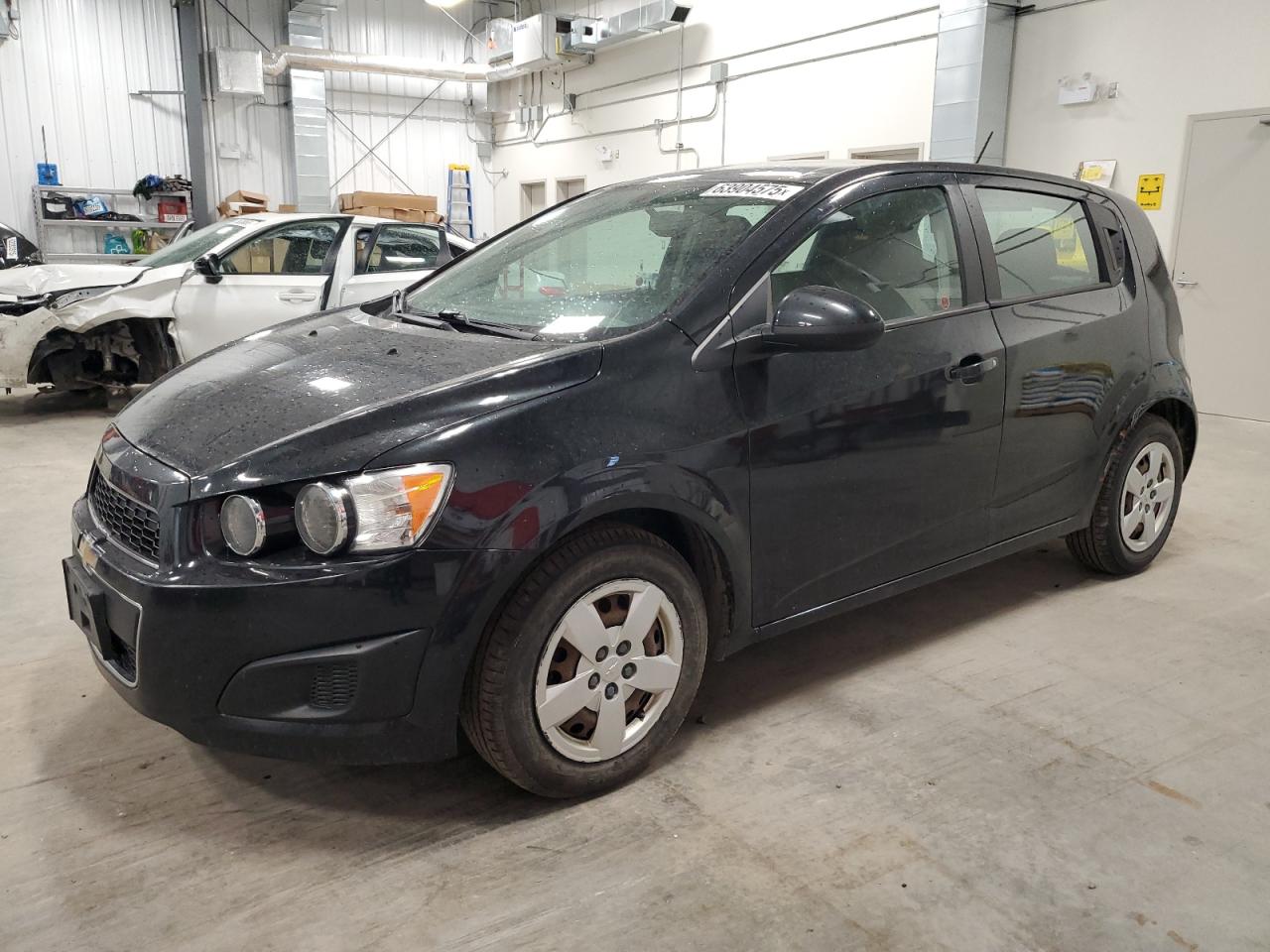 2015 Chevrolet Sonic Ls VIN: 1G1JA6SH0F4121144 Lot: 63904575