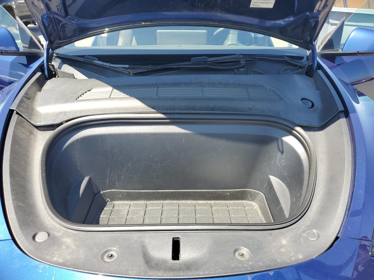 2023 Tesla Model Y VIN: 7SAYGAEE4PF700174 Lot: 65829205