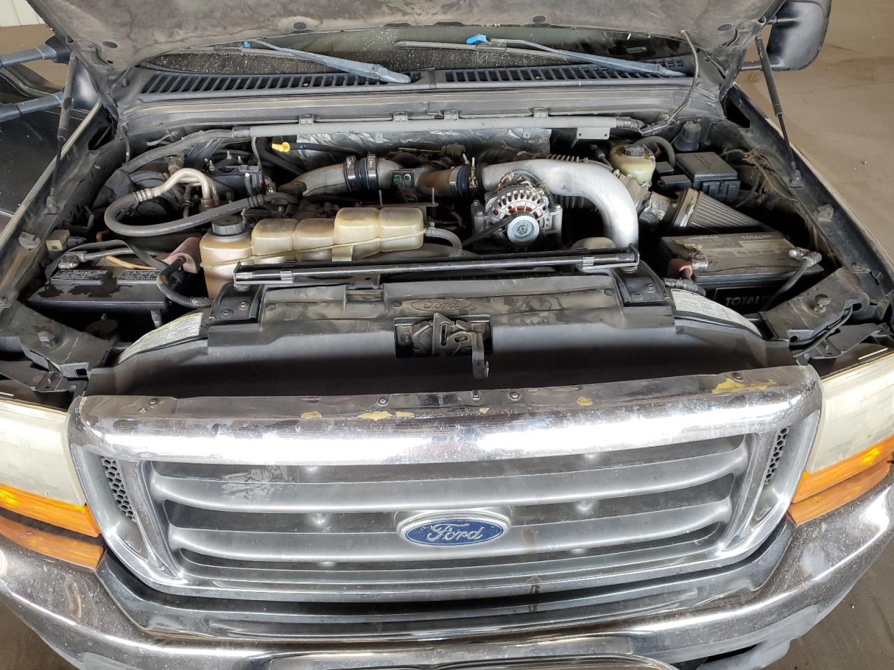 1999 Ford F250 Super Duty VIN: 1FTNF21F0XEA06235 Lot: 65437075
