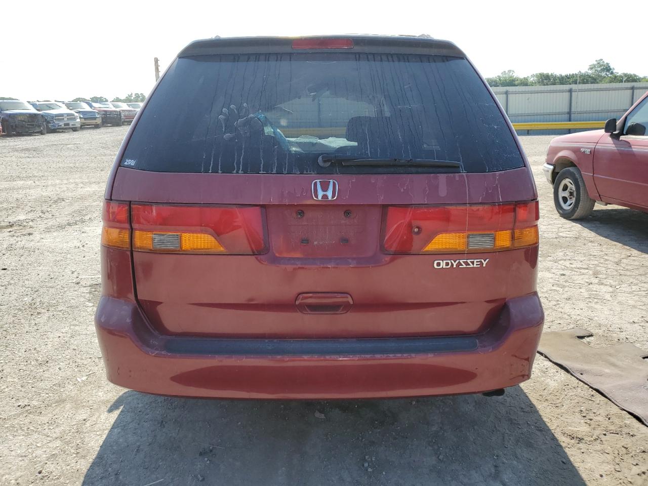 2002 Honda Odyssey Ex VIN: 2HKRL186X2H560188 Lot: 64648455