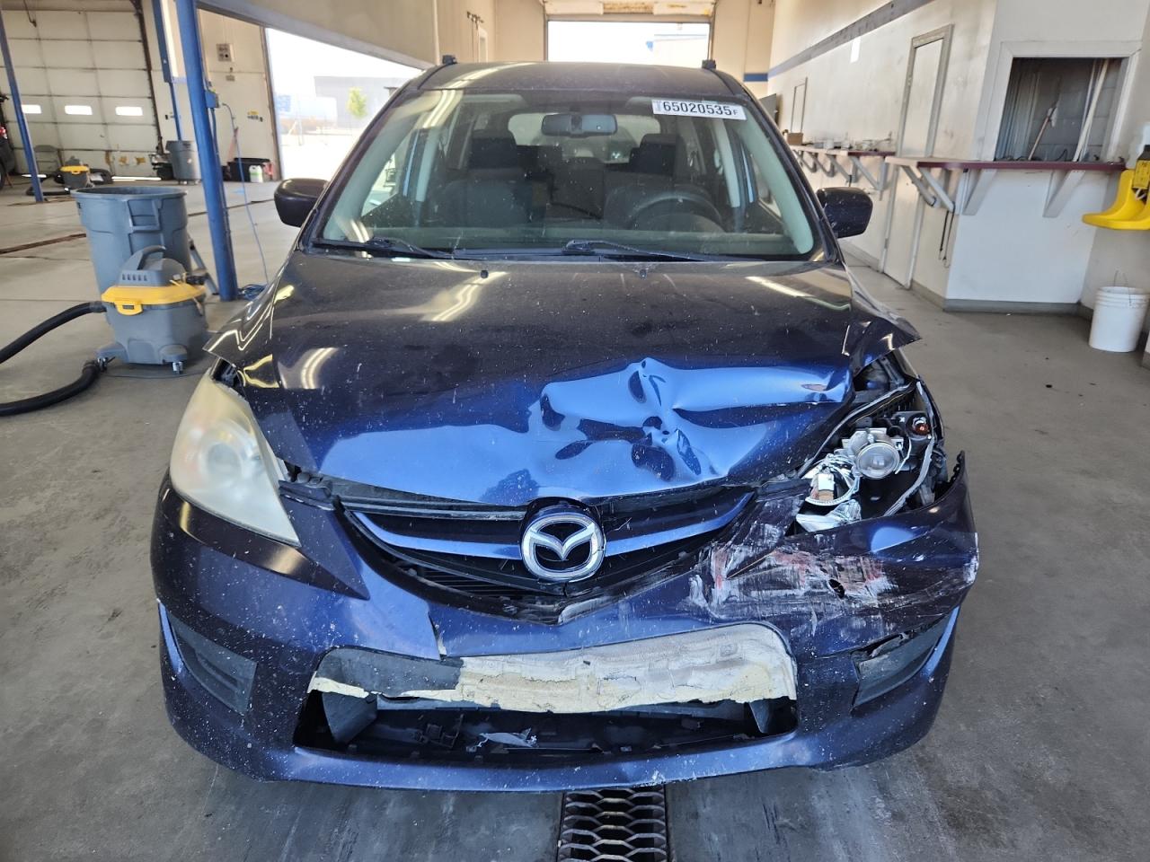 2009 Mazda 5 VIN: JM1CR293590355710 Lot: 65020535