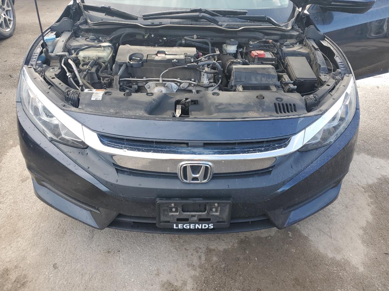 2018 Honda Civic Lx VIN: 19XFC2F58JE013765 Lot: 66997595