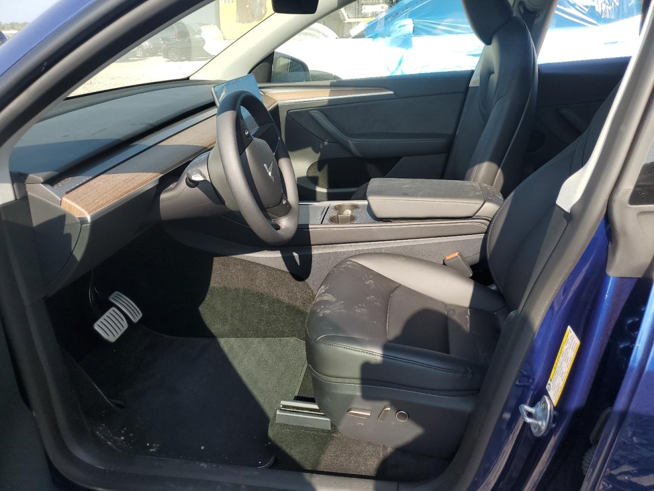 2025 Tesla Model Y VIN: 7SAYGDEF1SF235534 Lot: 64450605