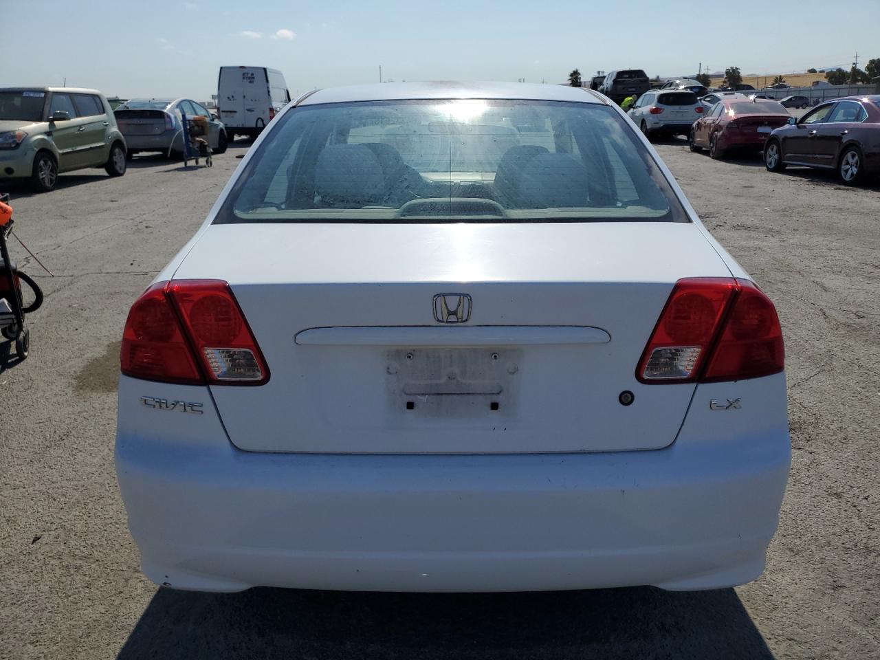 2004 Honda Civic Lx VIN: 2HGES16504H557390 Lot: 64332915