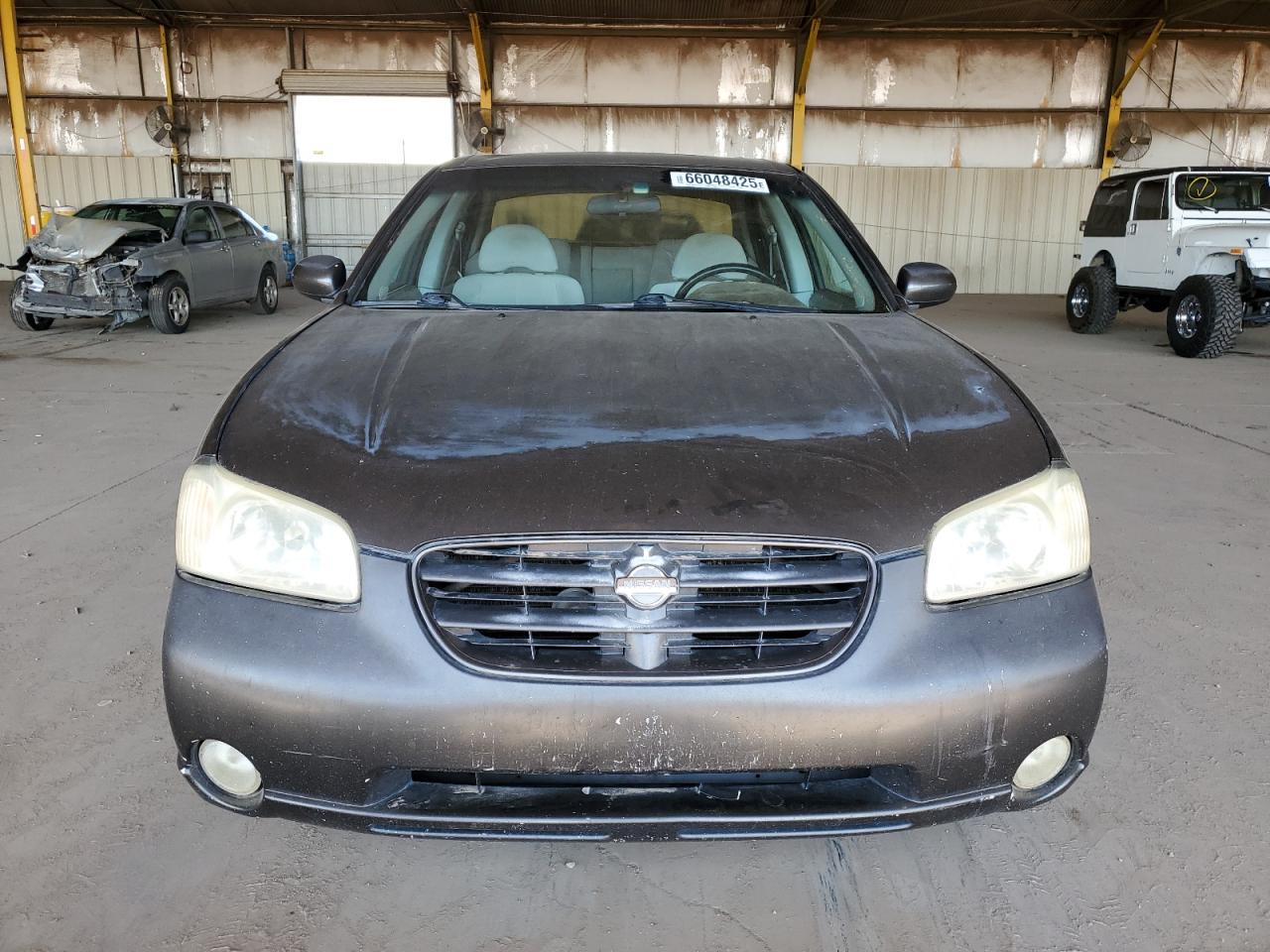 2000 Nissan Maxima Gle VIN: JN1CA31DXYT548730 Lot: 66048425