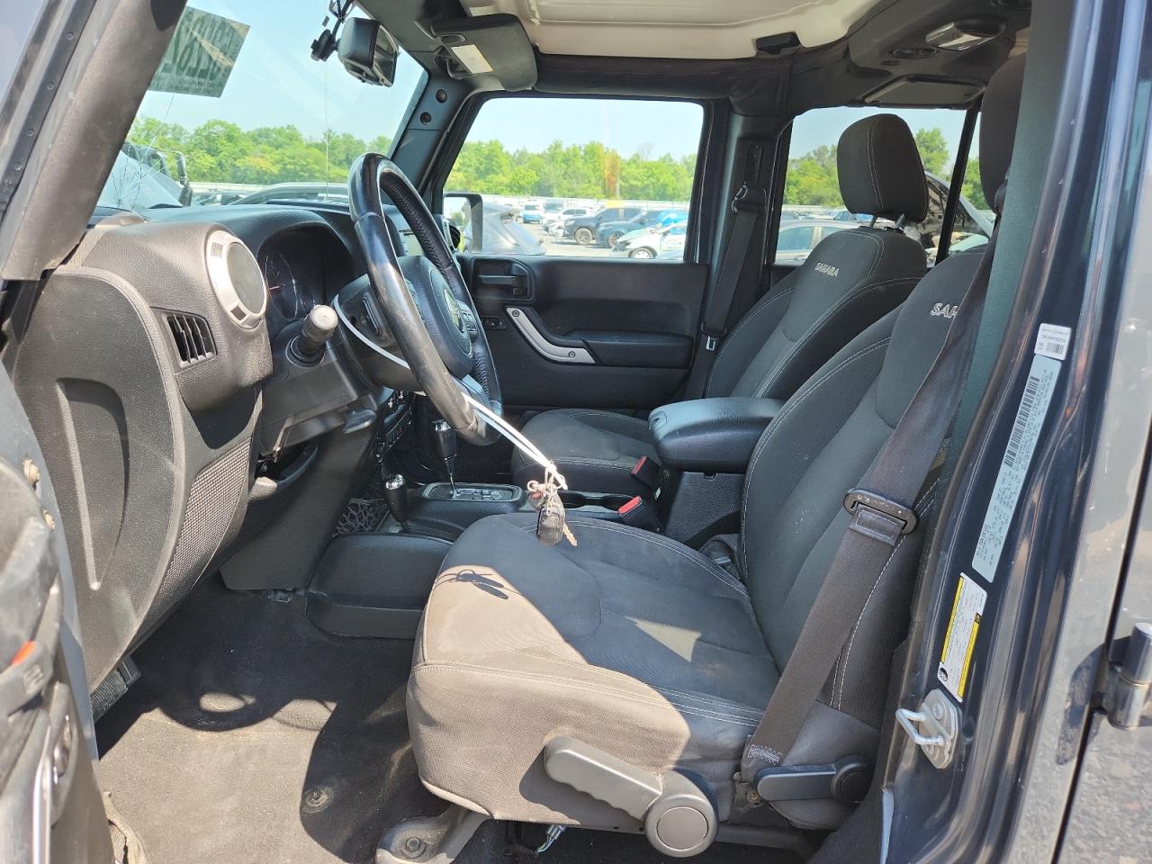 2016 Jeep Wrangler Unlimited Sahara VIN: 1C4BJWEG2GL288756 Lot: 62282015