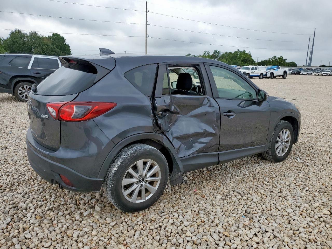 2015 Mazda Cx-5 Touring VIN: JM3KE2CY1F0548256 Lot: 64115345