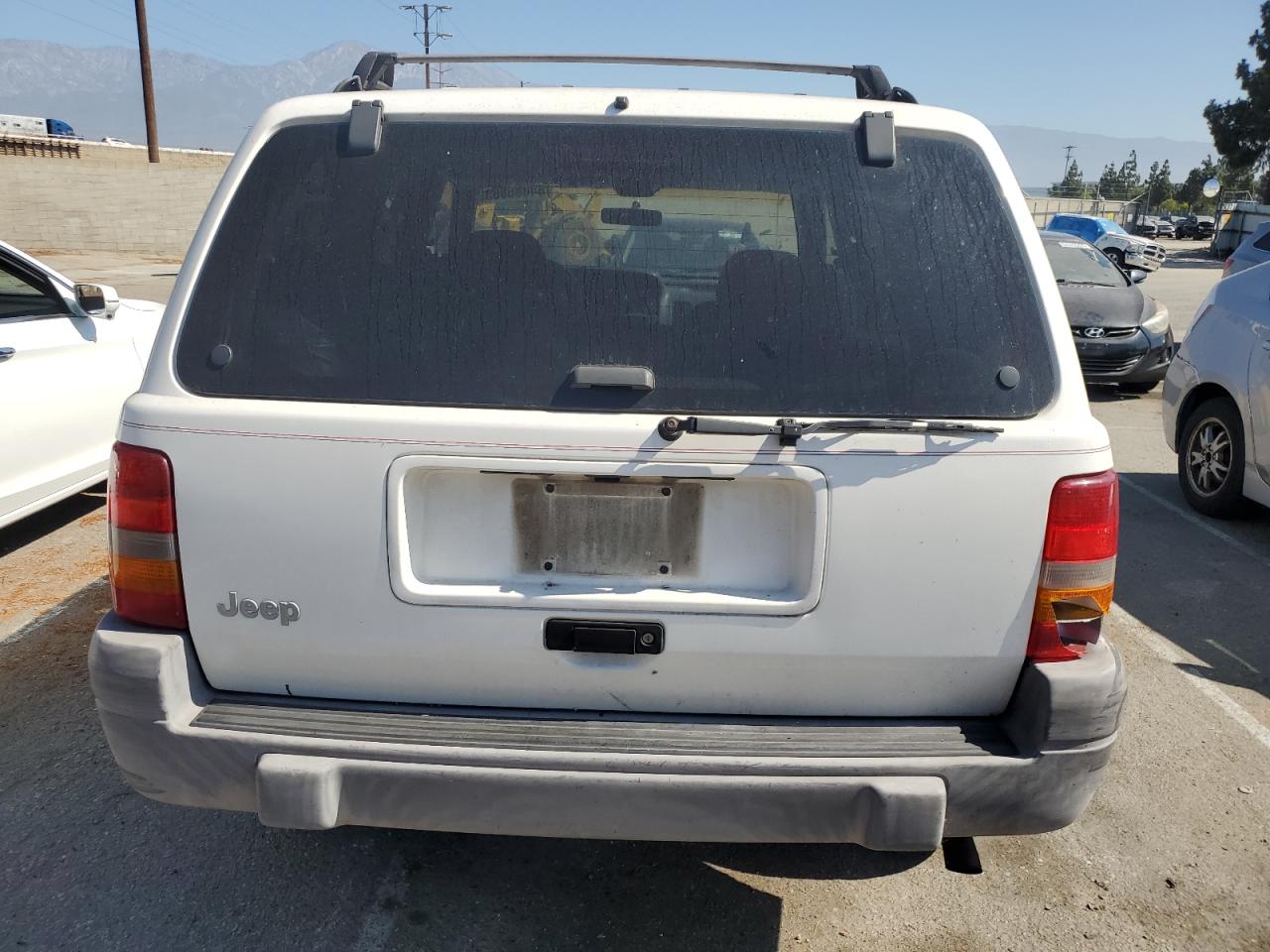 1997 Jeep Grand Cherokee Laredo VIN: 1J4FX58S1VC743761 Lot: 64685865