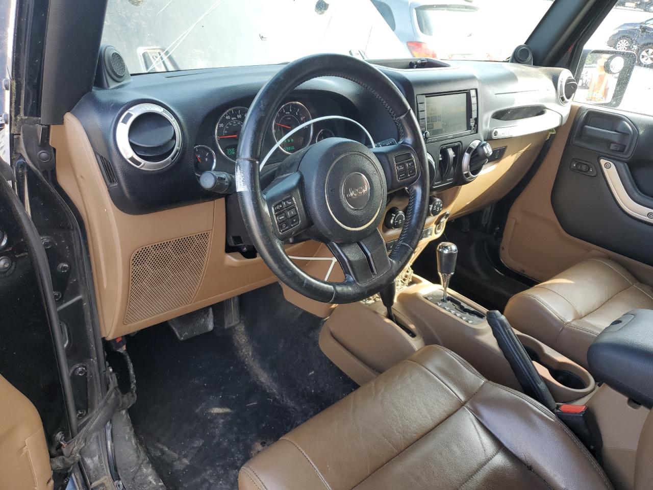 2011 Jeep Wrangler Sahara VIN: 1J4AA5D15BL552185 Lot: 63065185