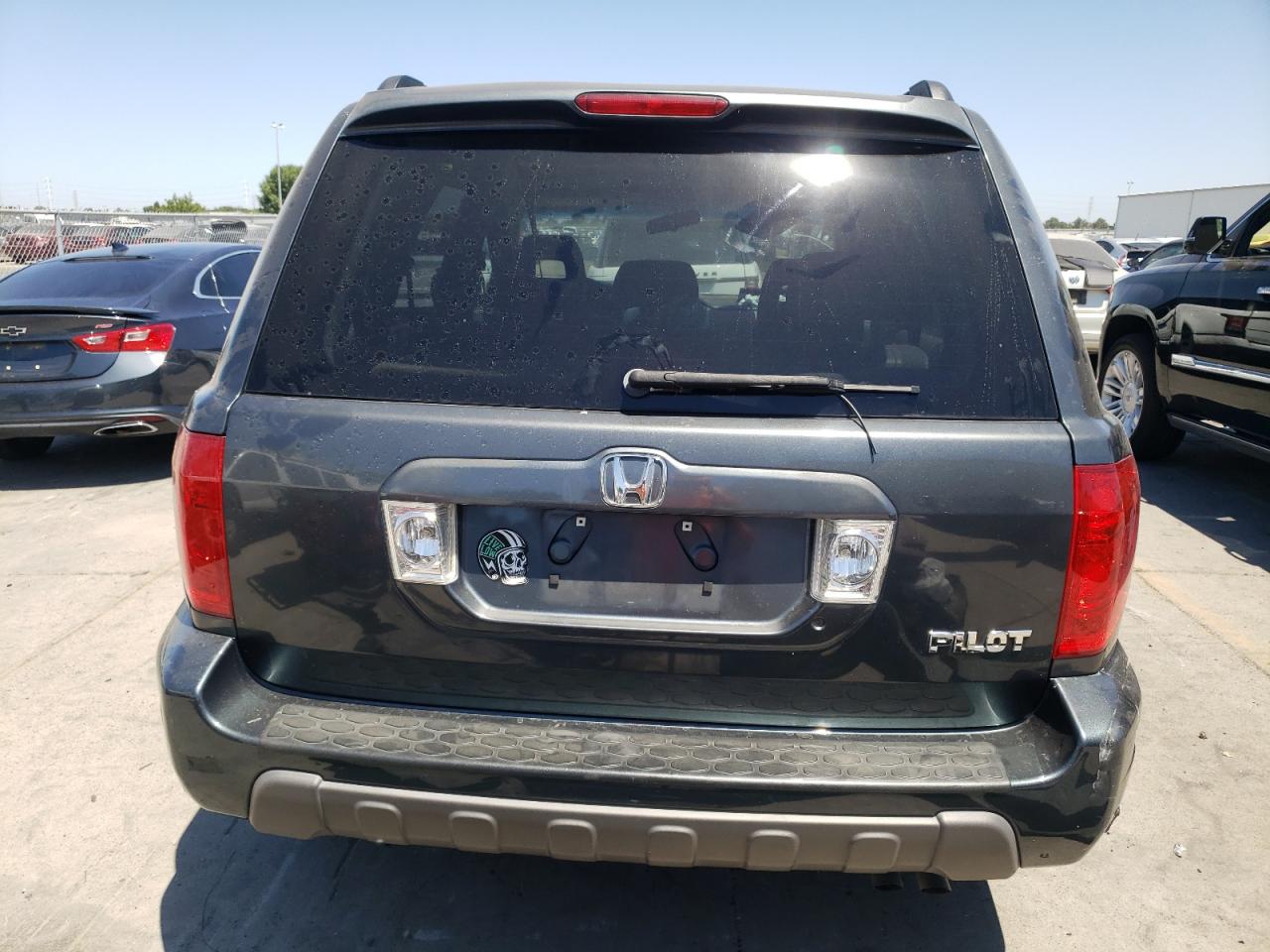 2003 Honda Pilot Ex VIN: 2HKYF18403H551356 Lot: 65259405