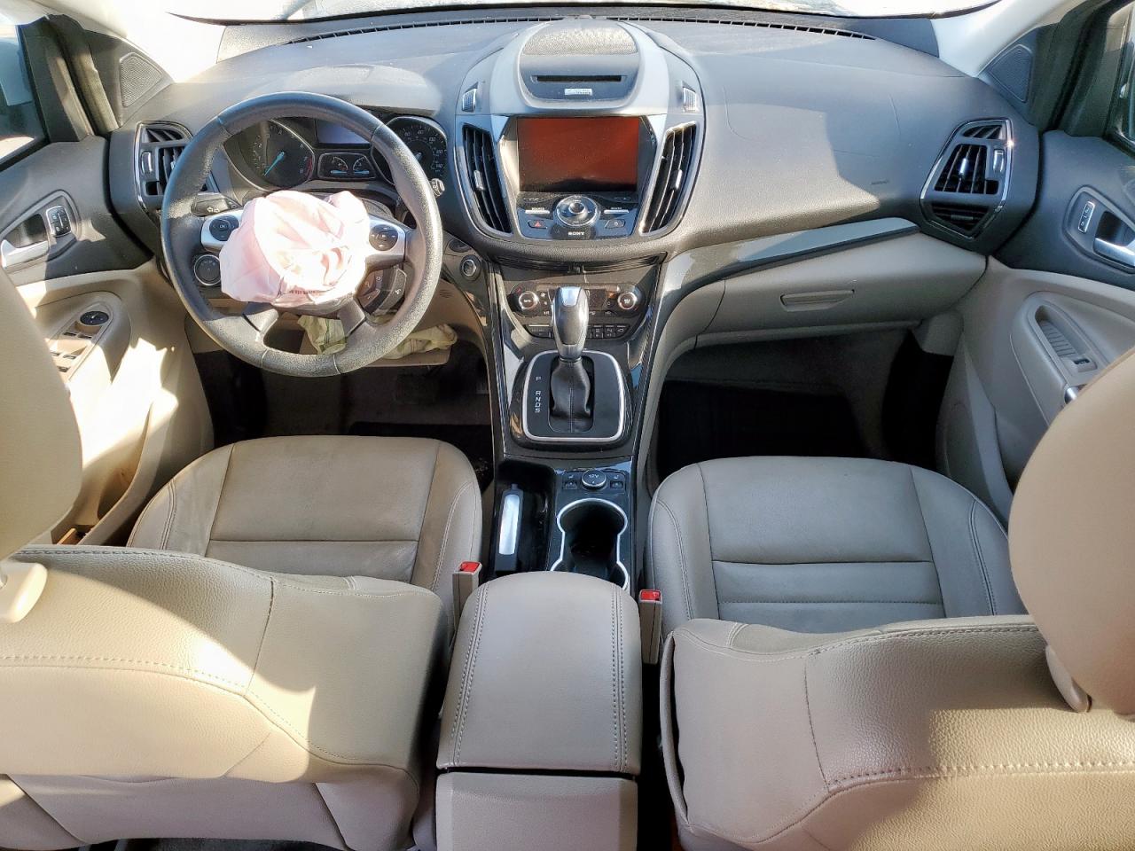 2014 Ford Escape Titanium VIN: 1FMCU0J94EUB61882 Lot: 65084405