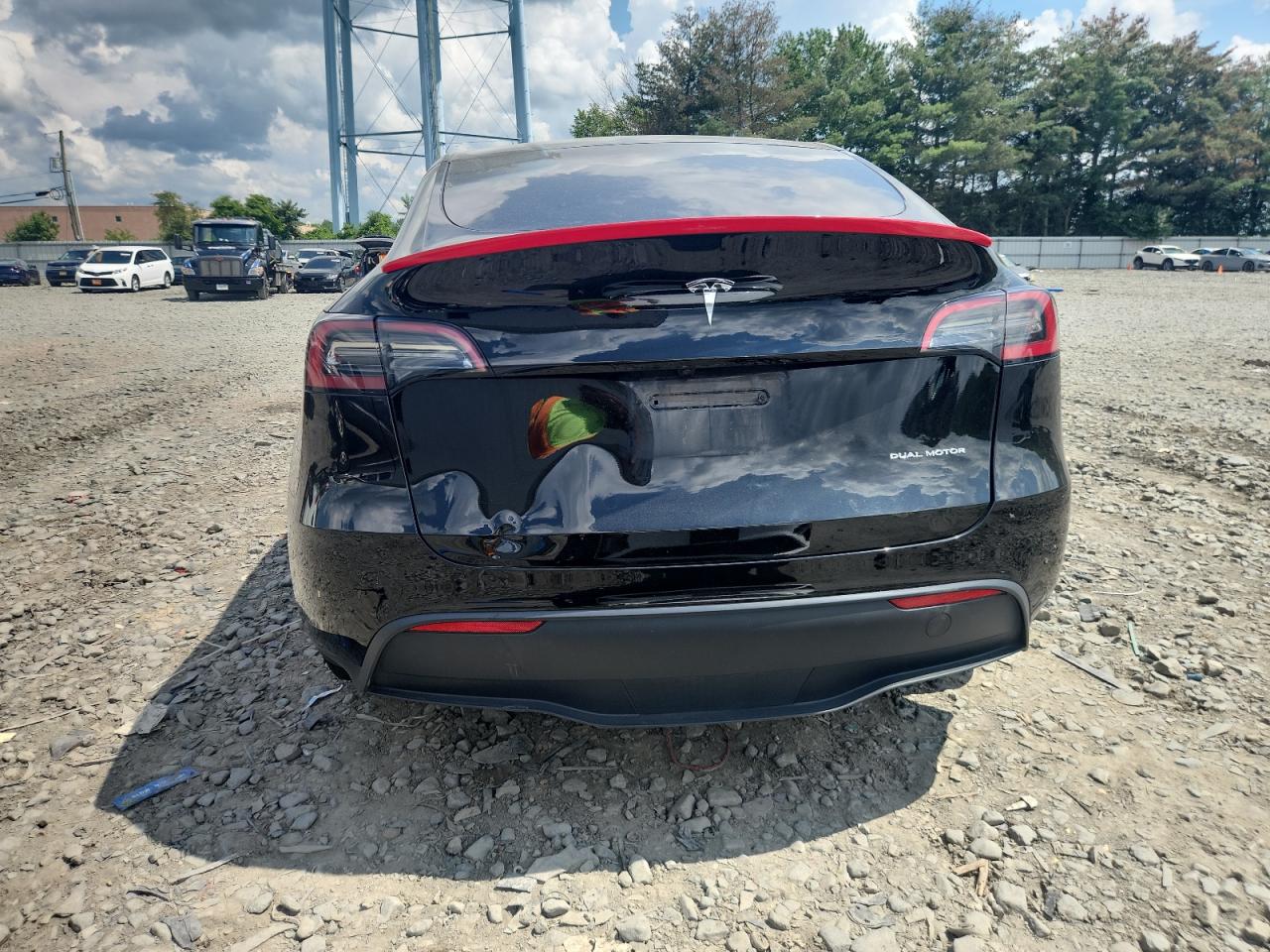 2023 Tesla Model Y VIN: 7SAYGAEE1PF805187 Lot: 64829605