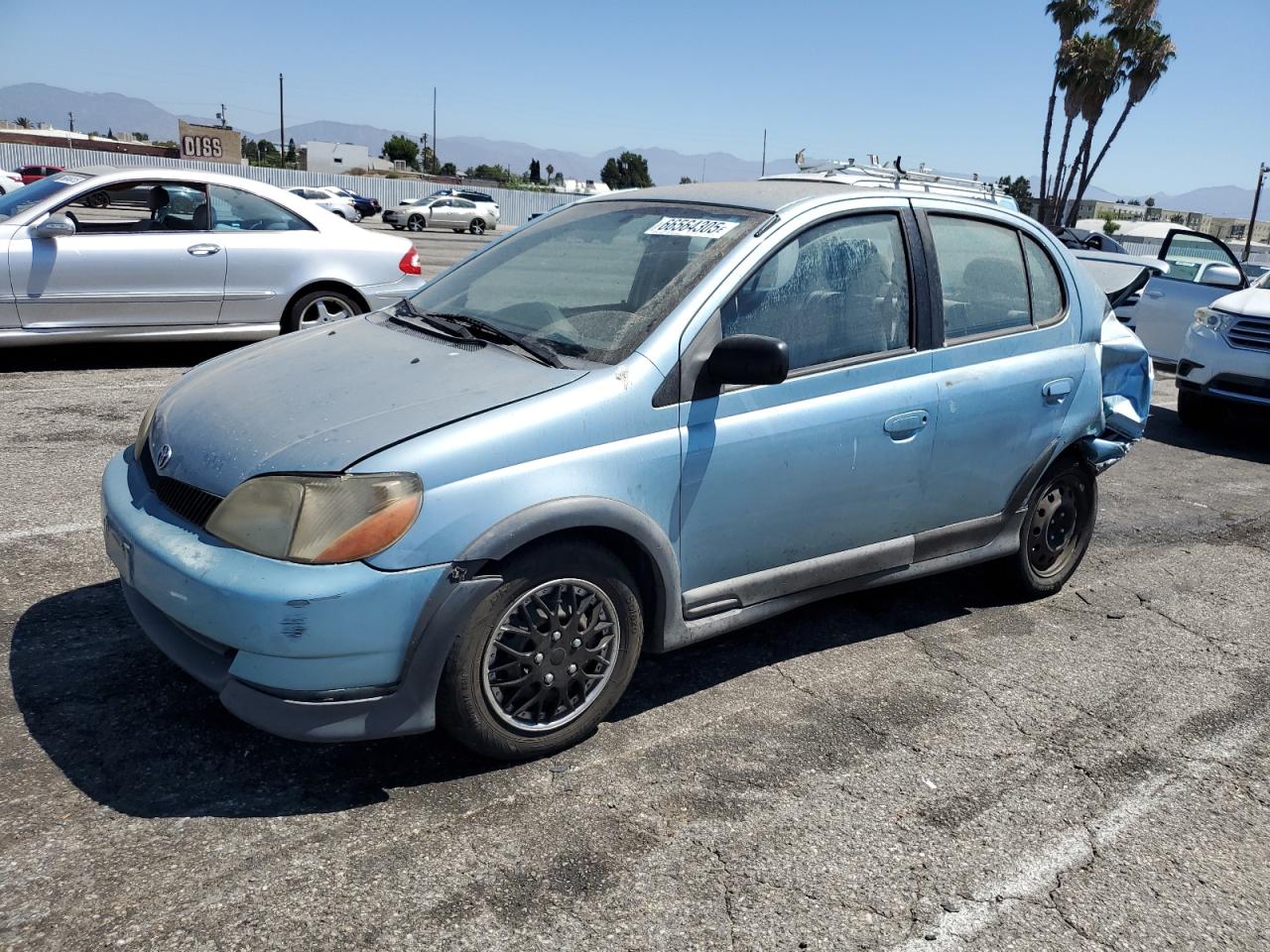 2001 Toyota Echo VIN: JTDBT123910136223 Lot: 66564305