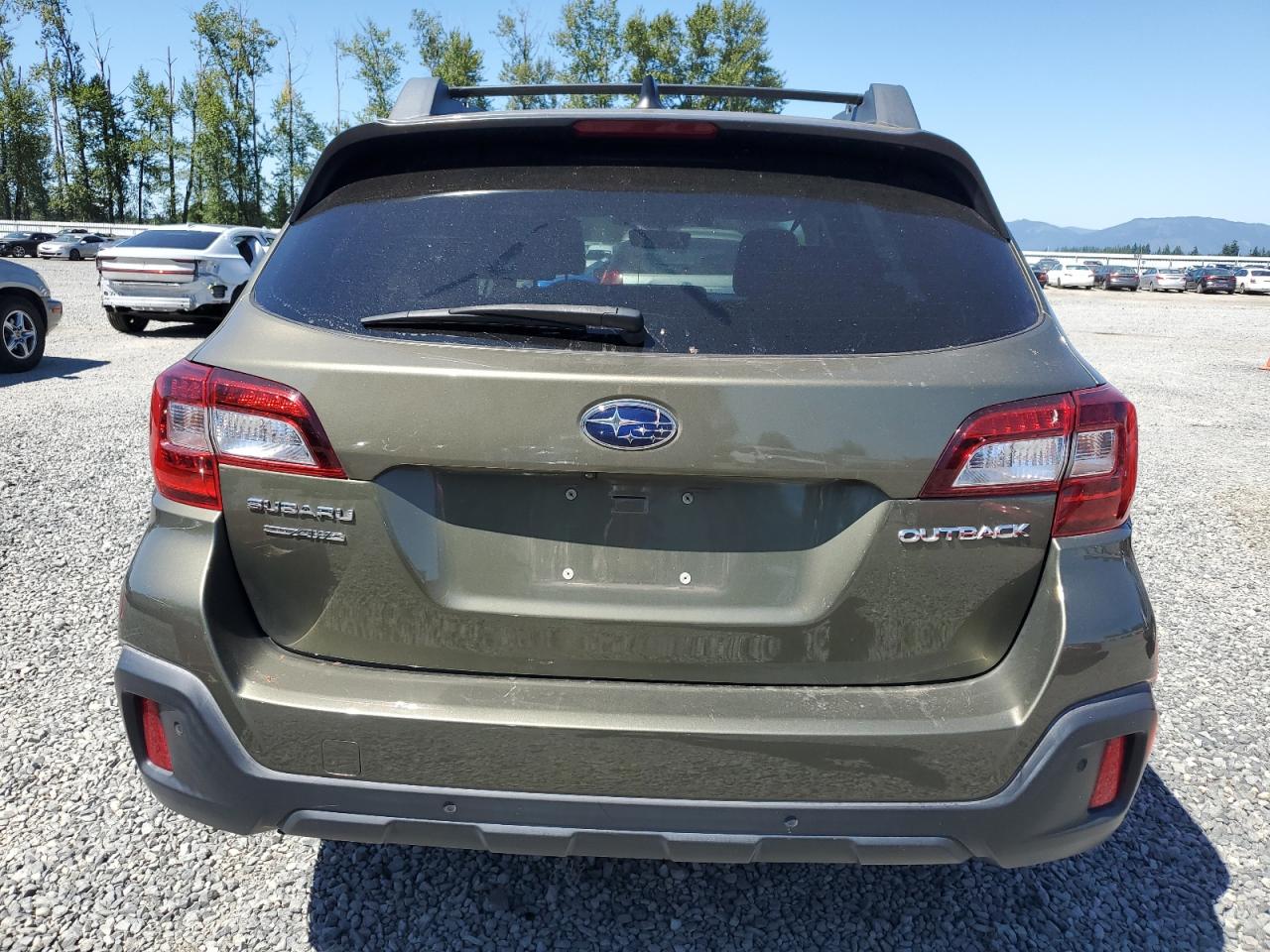 2018 Subaru Outback Touring VIN: 4S4BSATC1J3332359 Lot: 65064775